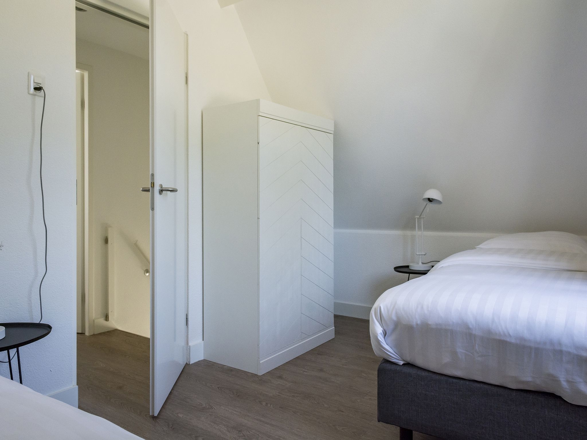 Een slaapkamer van Bouwlust E23 in De Cocksdorp Texel