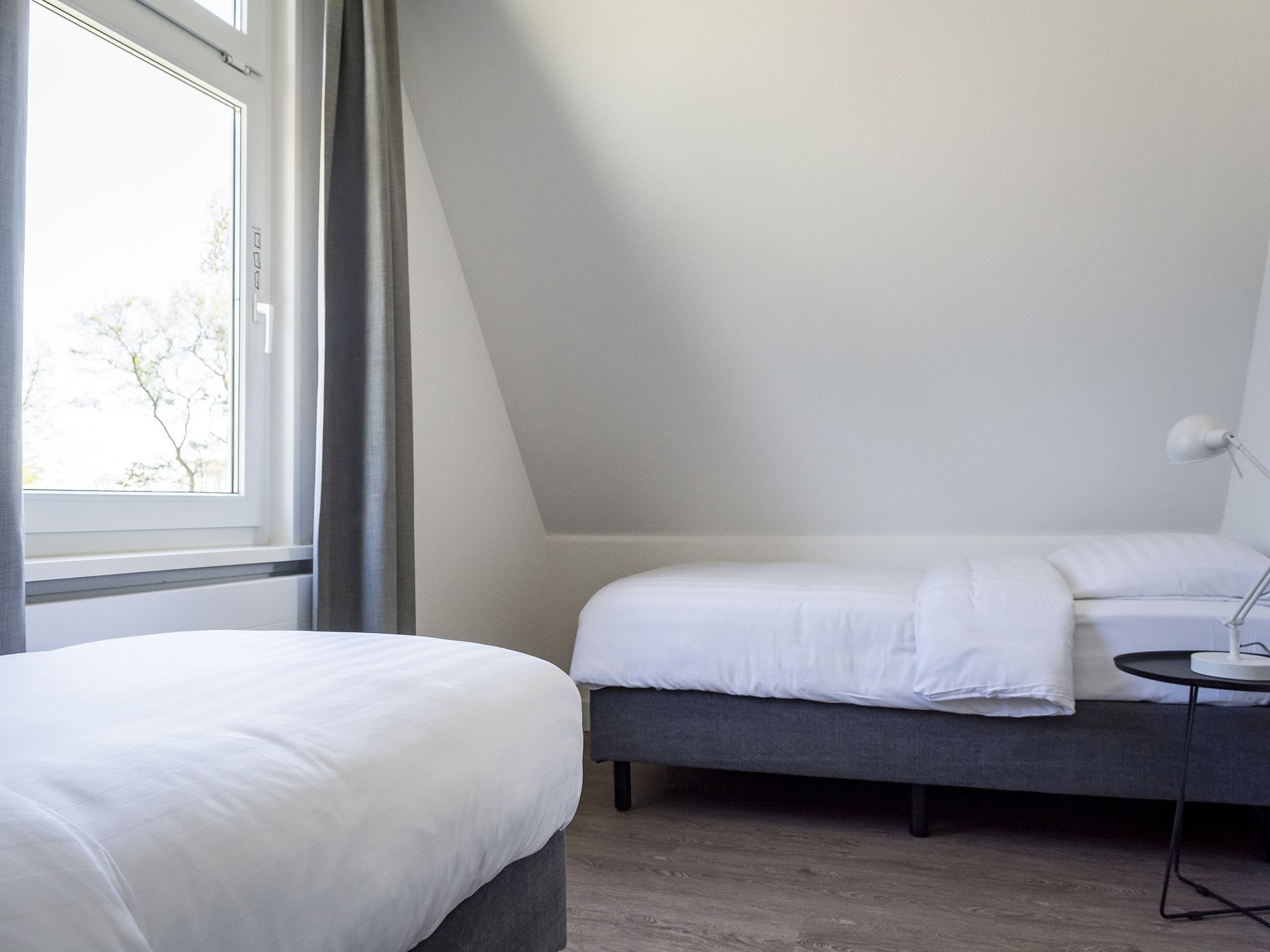 Een slaapkamer van Bouwlust E23 in De Cocksdorp Texel