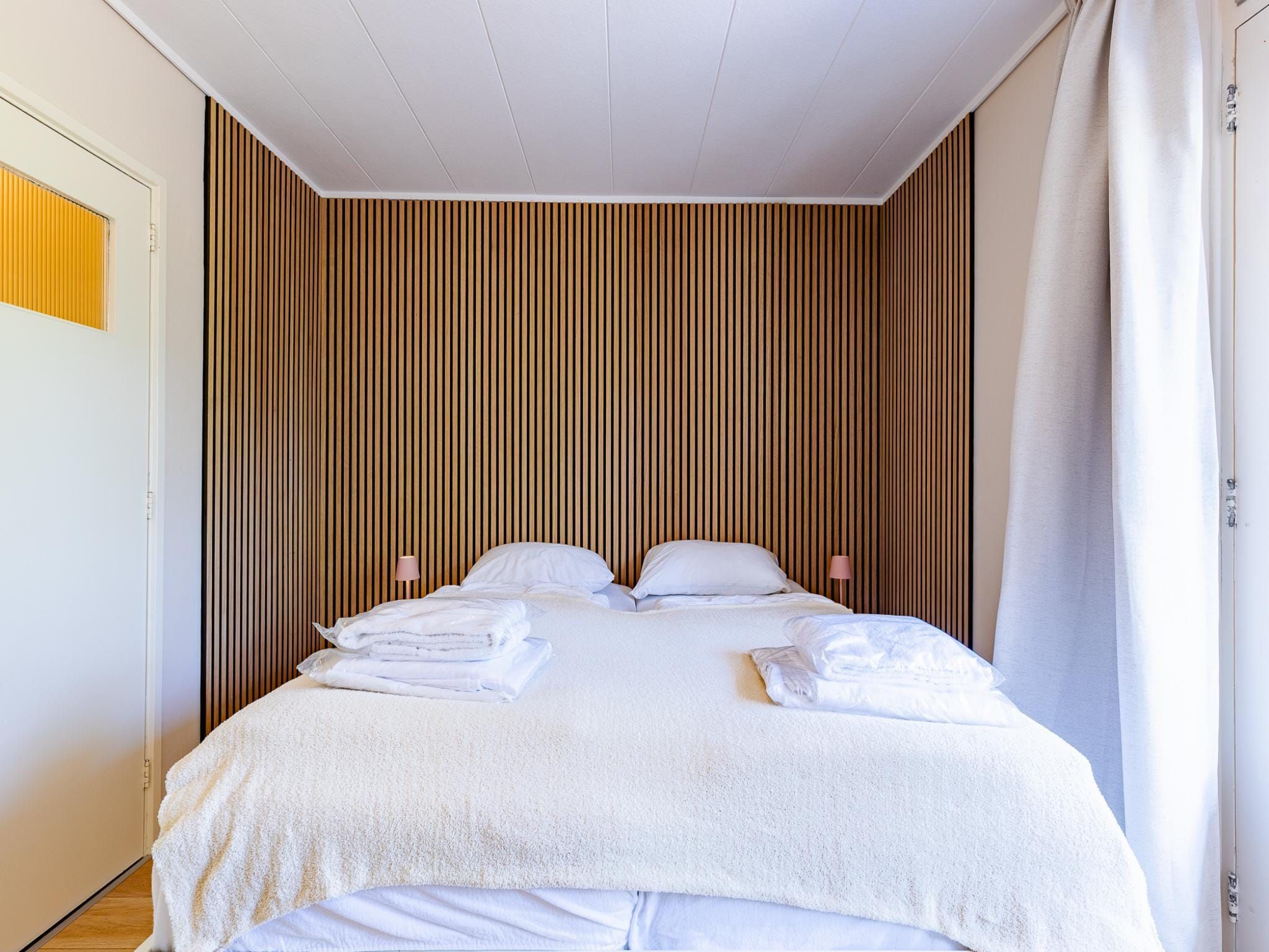 Een slaapkamer van Appartement Burg van Woelderenlaan in Vlissingen