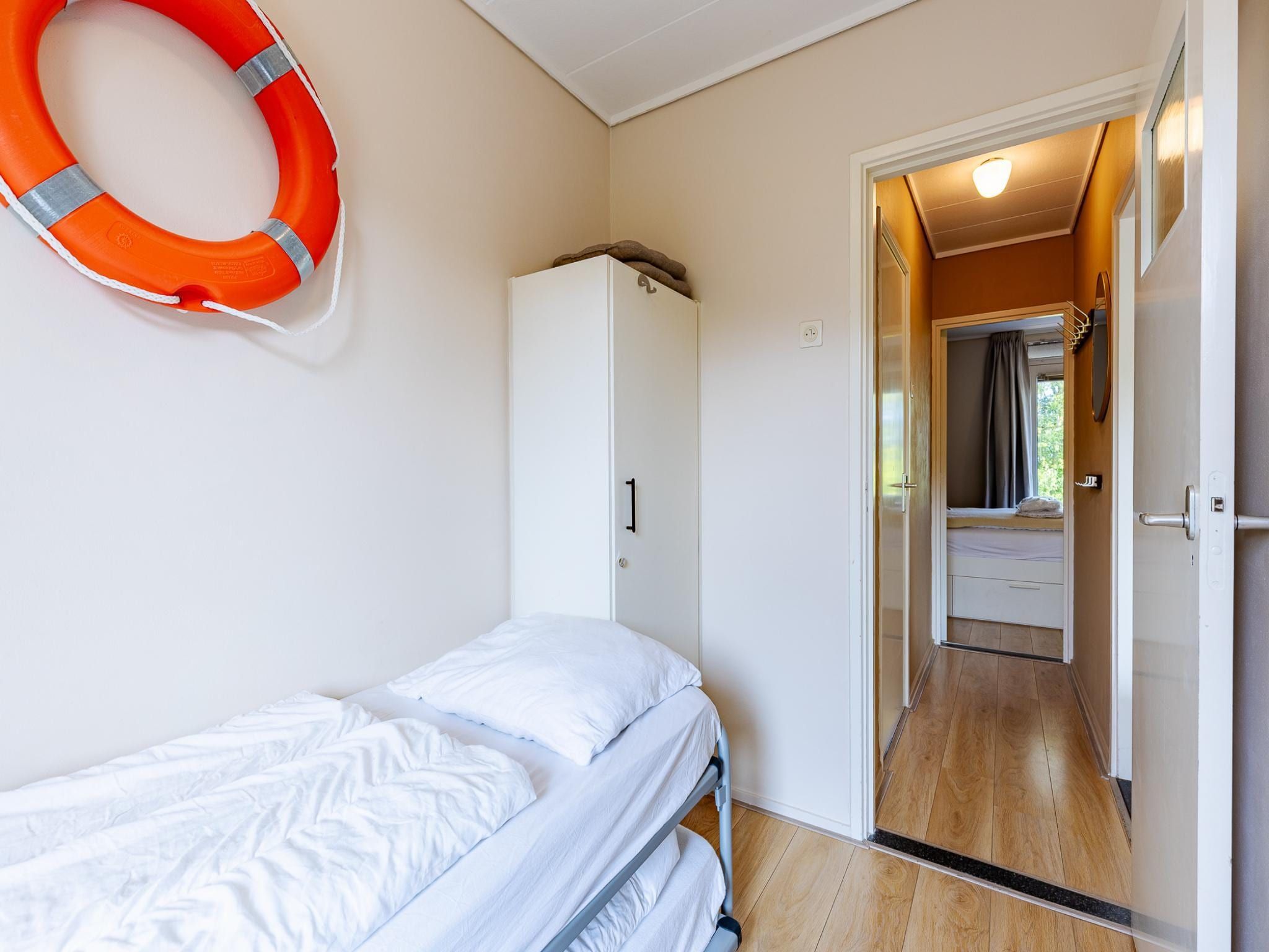 Een slaapkamer van Appartement Burg van Woelderenlaan in Vlissingen