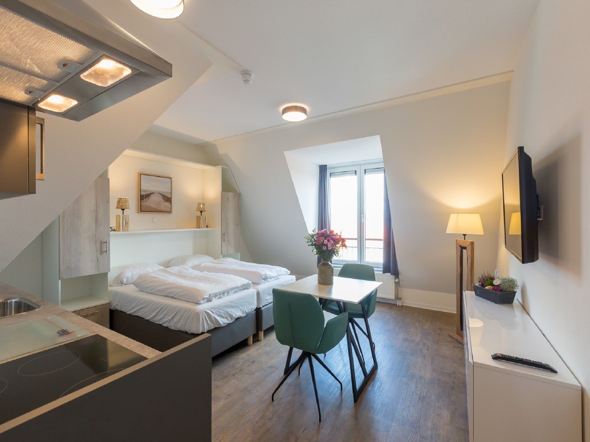 Een slaapkamer van Aparthotel Zoutelande - 2 pers luxe studio - huisdier in Zoutelande