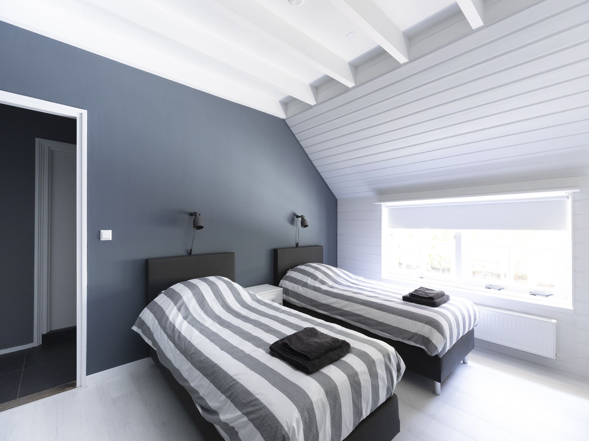 Een slaapkamer van De Groene Lantaarn in Groet (Schoorl)