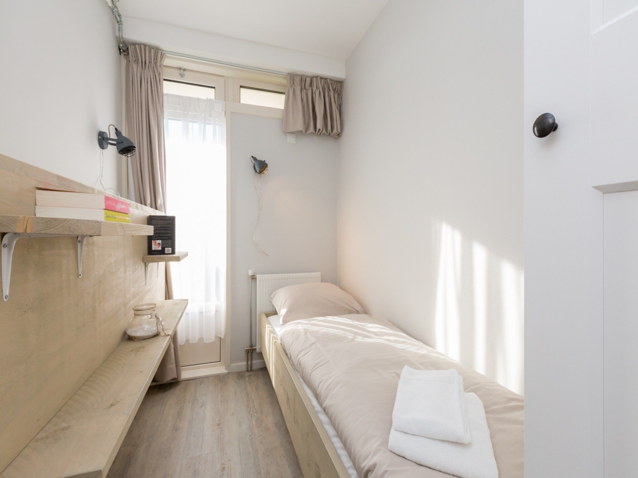 Een slaapkamer van Kurhaus- appartement 5 Zoutelande in Zoutelande