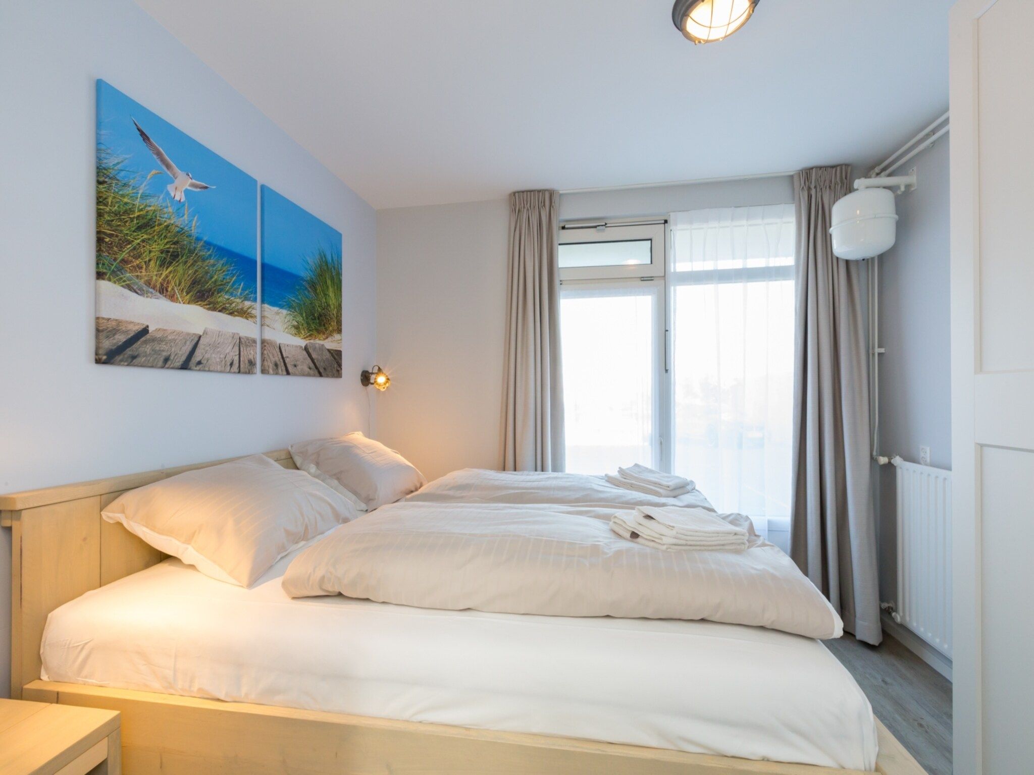 Een slaapkamer van Kurhaus- appartement 5 Zoutelande in Zoutelande