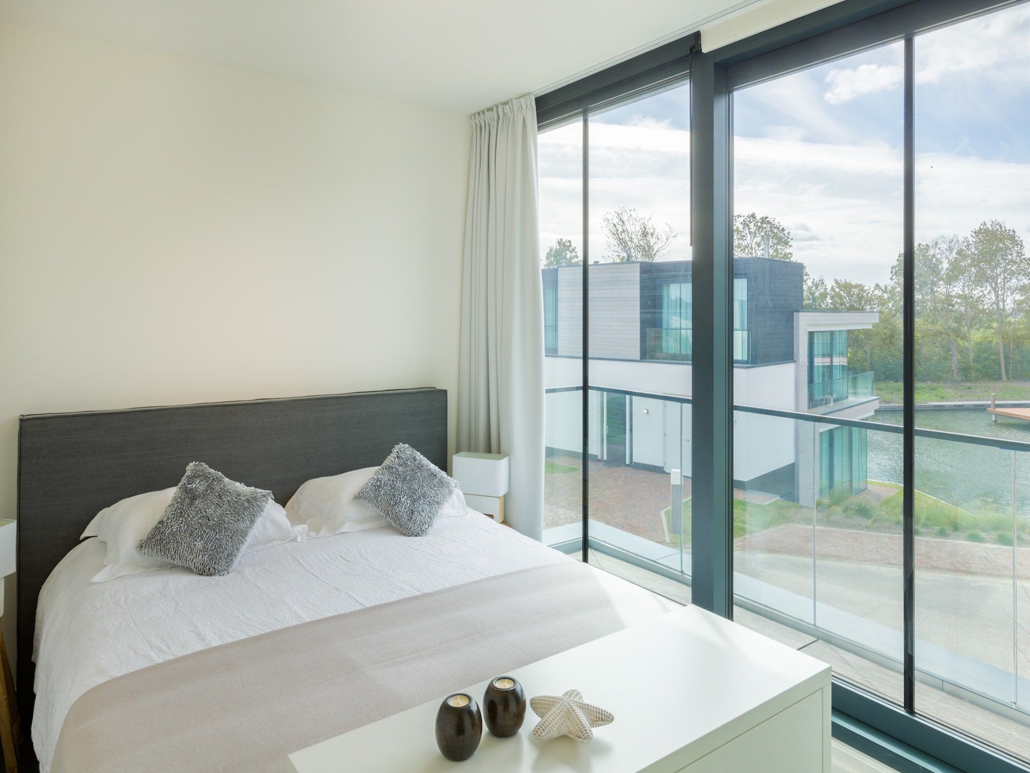 Een slaapkamer van Harbour Village 1 in Arnemuiden