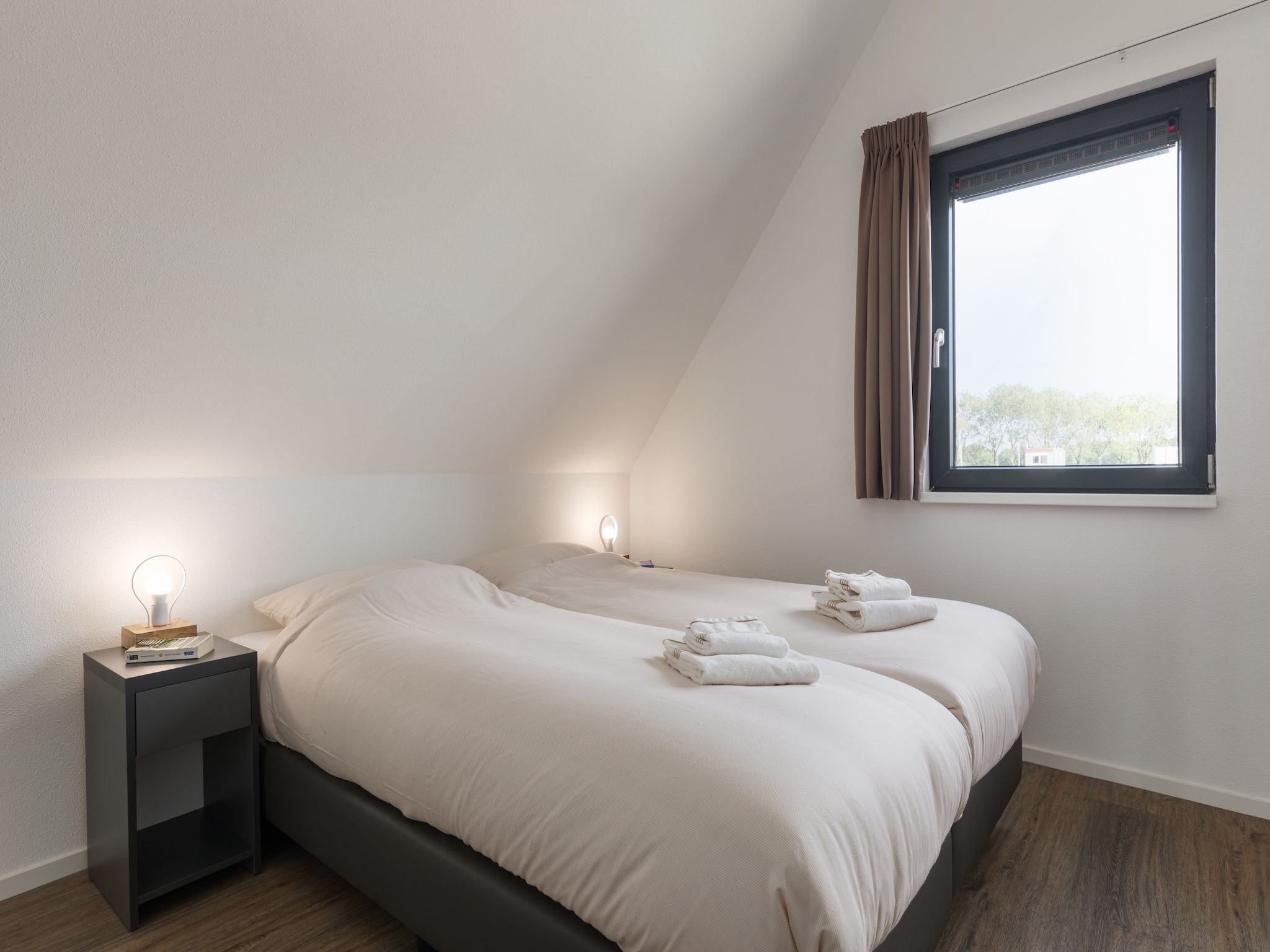 Een slaapkamer van Waterstaete Ossenzijl 3 in Ossenzijl