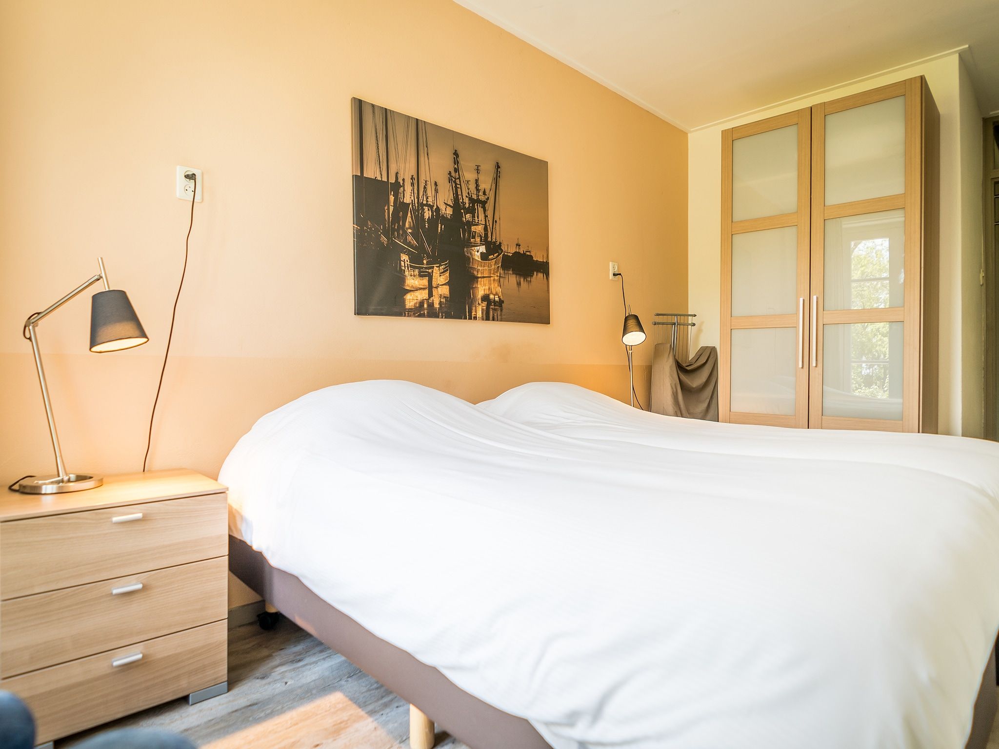 Een slaapkamer van Appartement Hoeve Holland R1 in De Cocksdorp - Texel