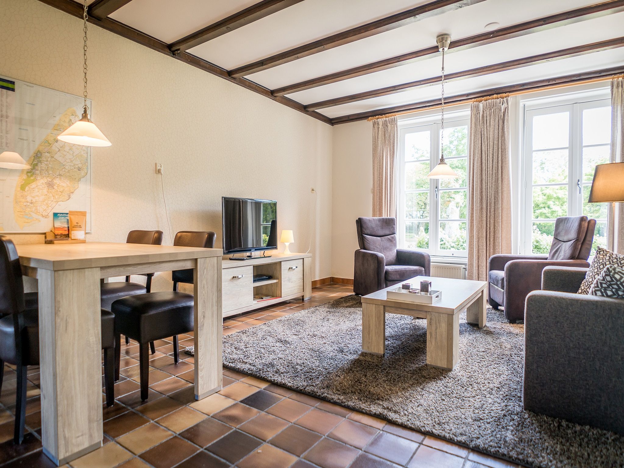 De woonkamer van Appartement Hoeve Holland R1 in De Cocksdorp - Texel