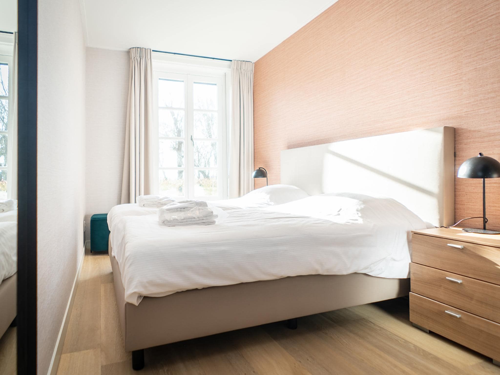 Een slaapkamer van Appartement Hoeve Holland R1 in De Cocksdorp - Texel