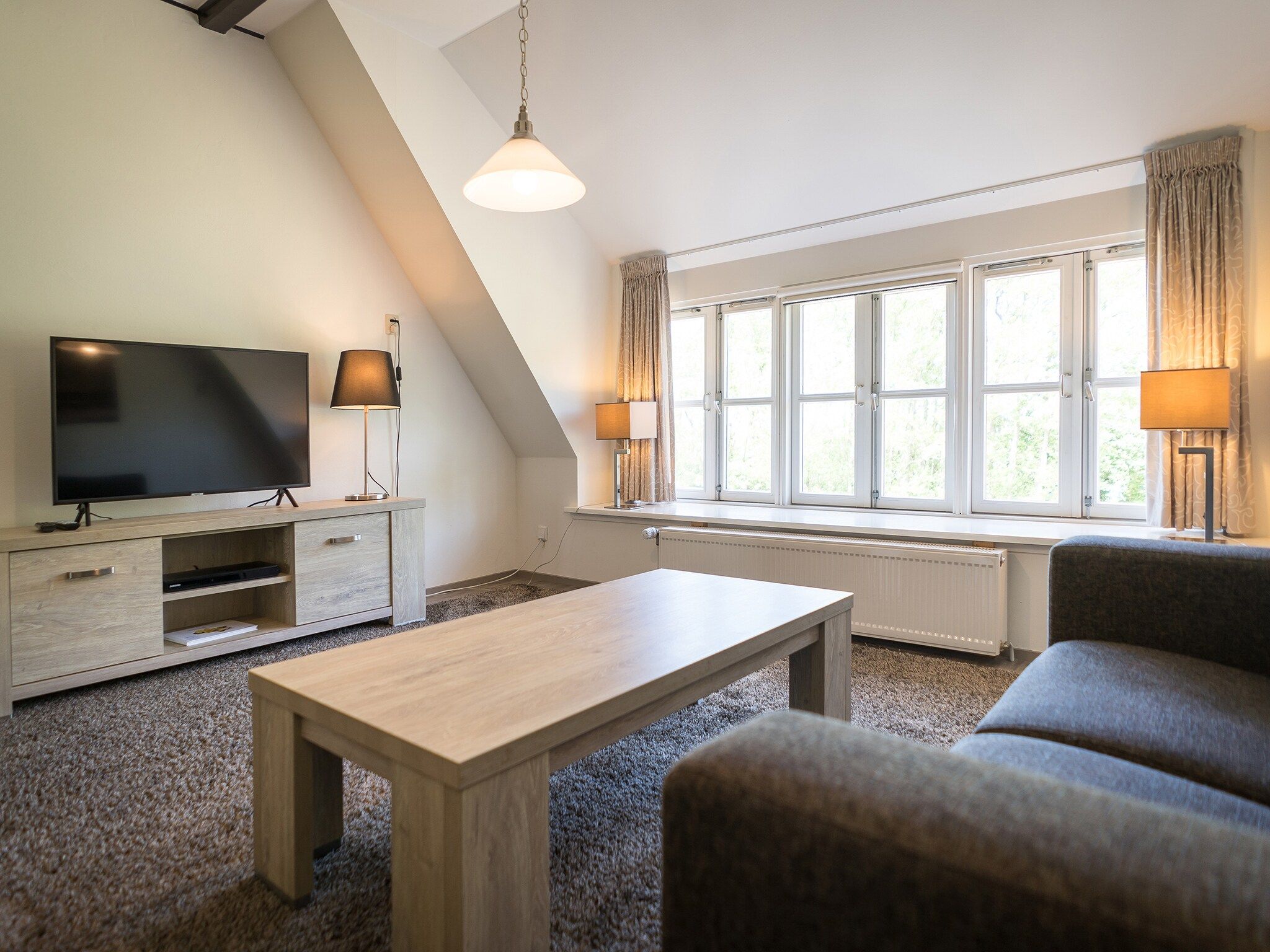 De woonkamer van Appartement Hoeve Holland X7 in De Cocksdorp Texel