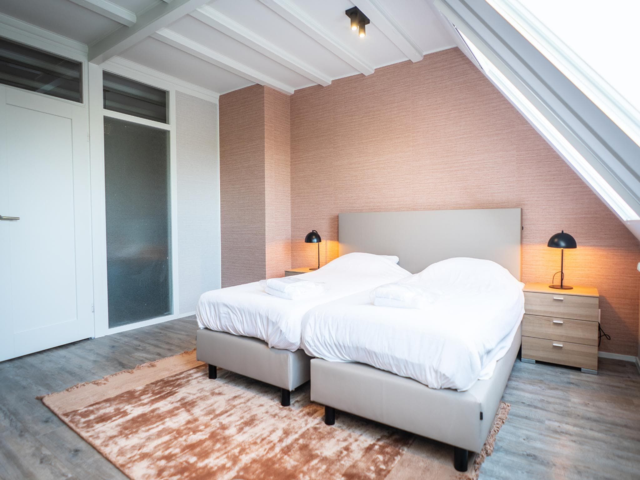 Een slaapkamer van Appartement Hoeve Holland X7 in De Cocksdorp Texel