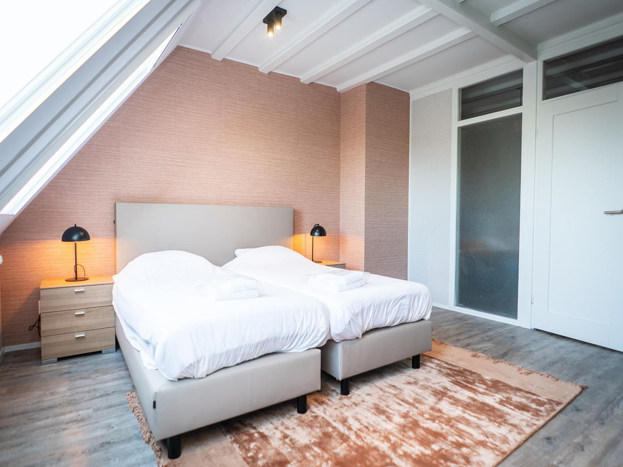 Een slaapkamer van Appartement Hoeve Holland X7 in De Cocksdorp Texel