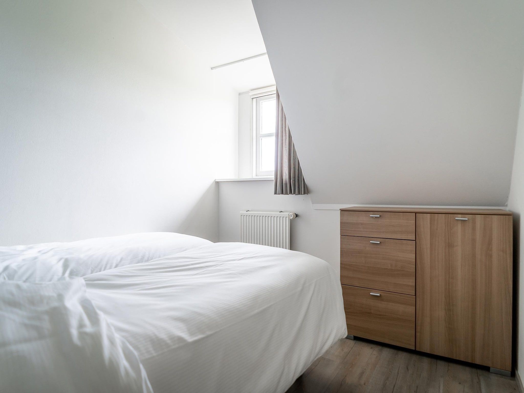 Een slaapkamer van App Hoeve Holland T4 in De Cocksdorp Texel