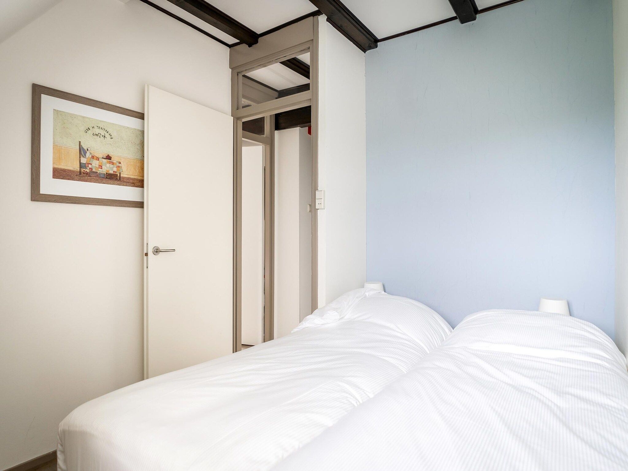 Een slaapkamer van App Hoeve Holland T4 in De Cocksdorp Texel