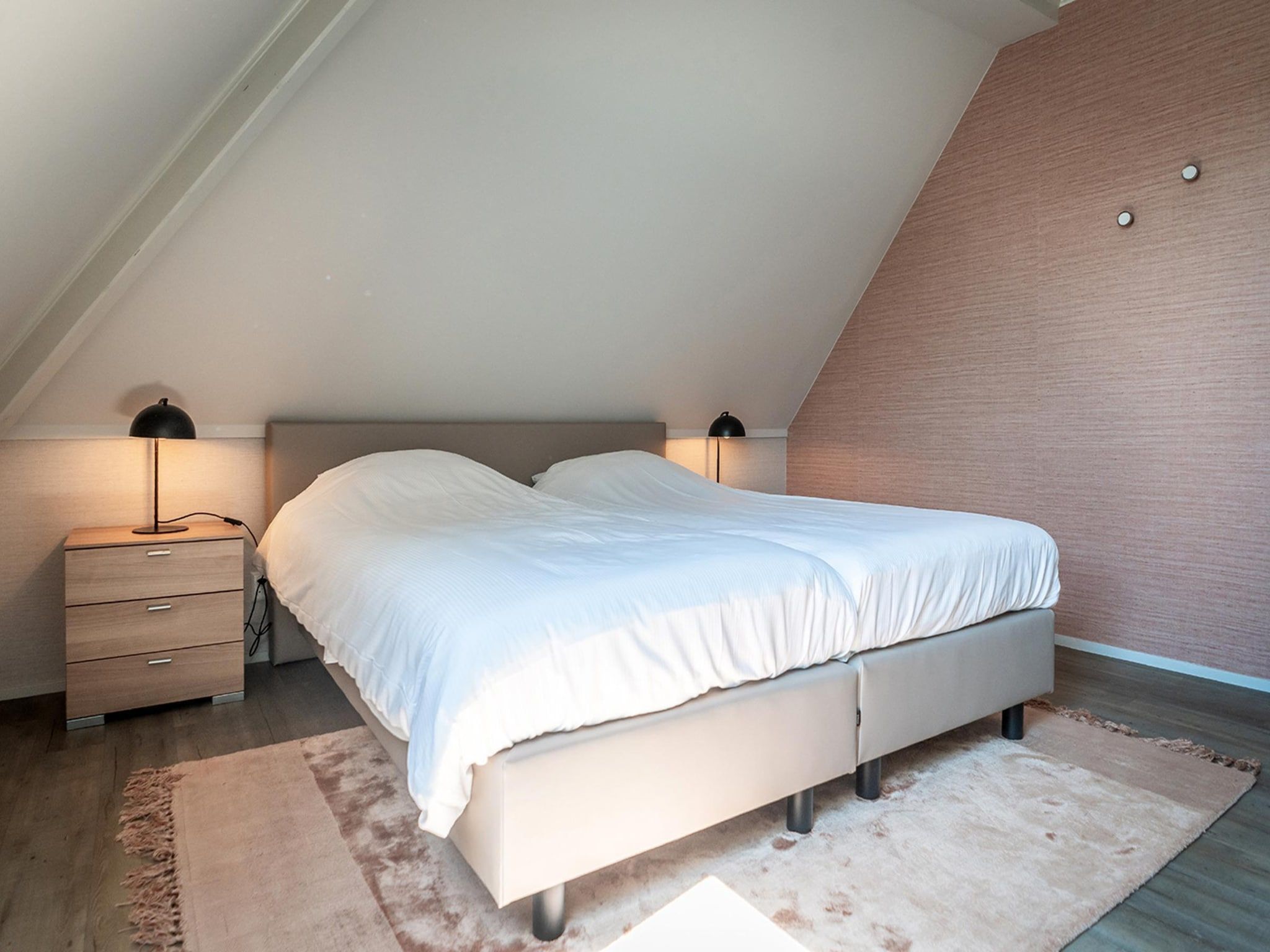 Een slaapkamer van App Hoeve Holland T4 in De Cocksdorp Texel