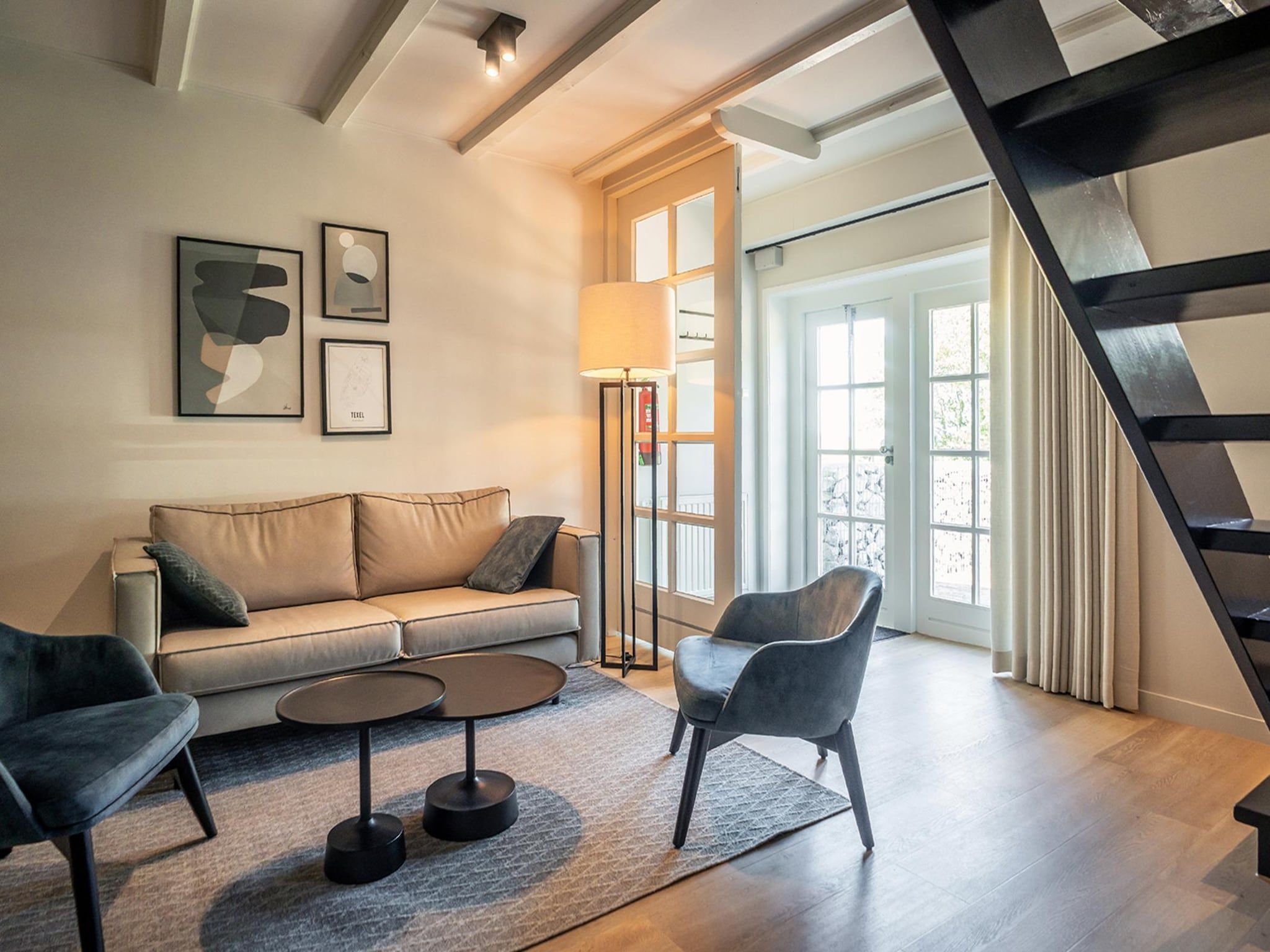 De woonkamer van App Hoeve Holland S2 in De Cocksdorp Texel