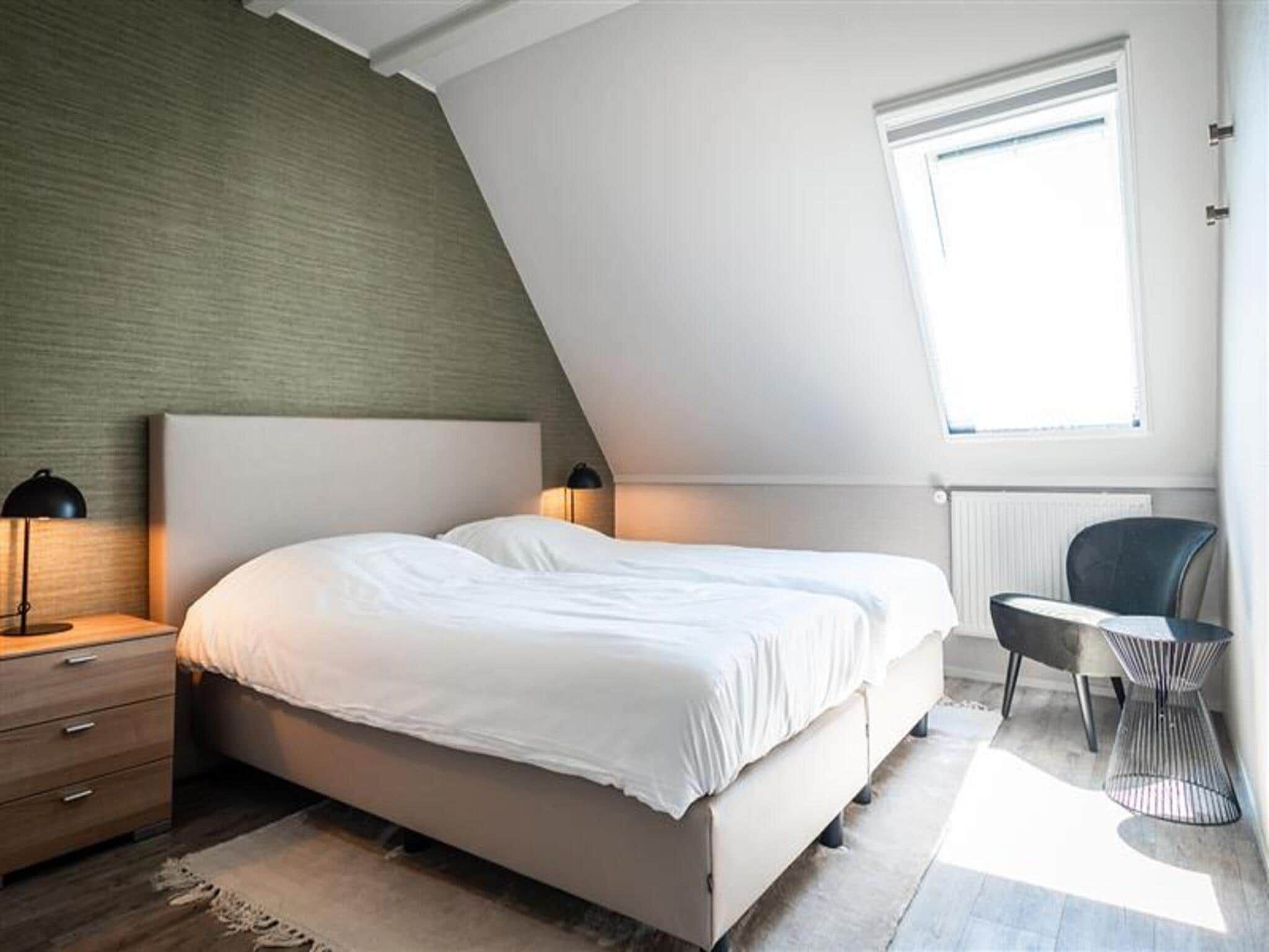 Een slaapkamer van App Hoeve Holland S5 in De Cocksdorp Texel