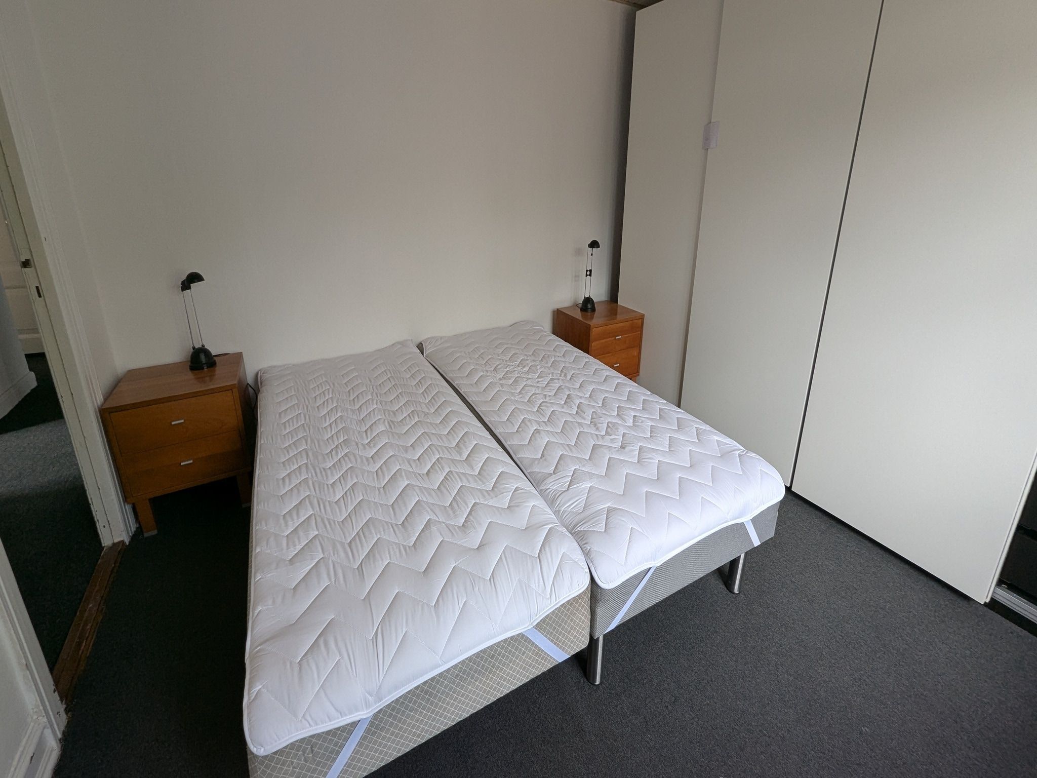 Een slaapkamer van App Hoeve Holland S5 in De Cocksdorp Texel