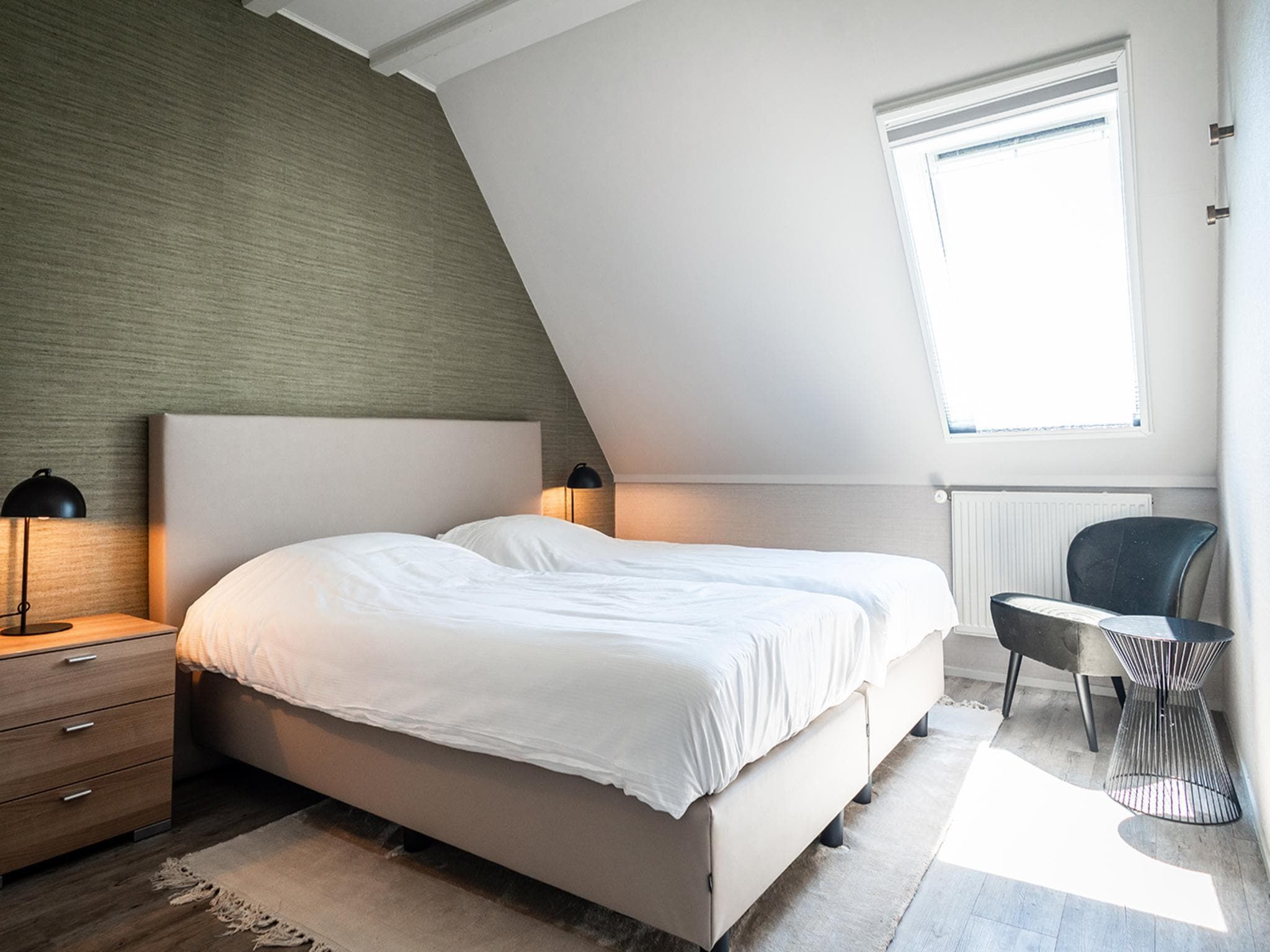 Een slaapkamer van App Hoeve Holland S5 in De Cocksdorp Texel