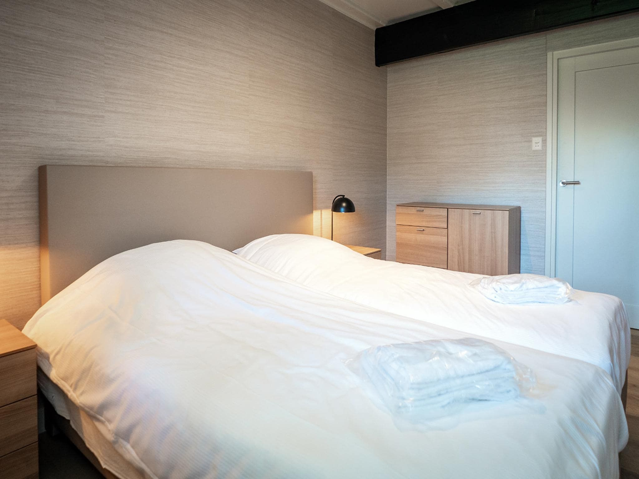 Een slaapkamer van App Hoeve Holland W6 in De Cocksdorp Texel