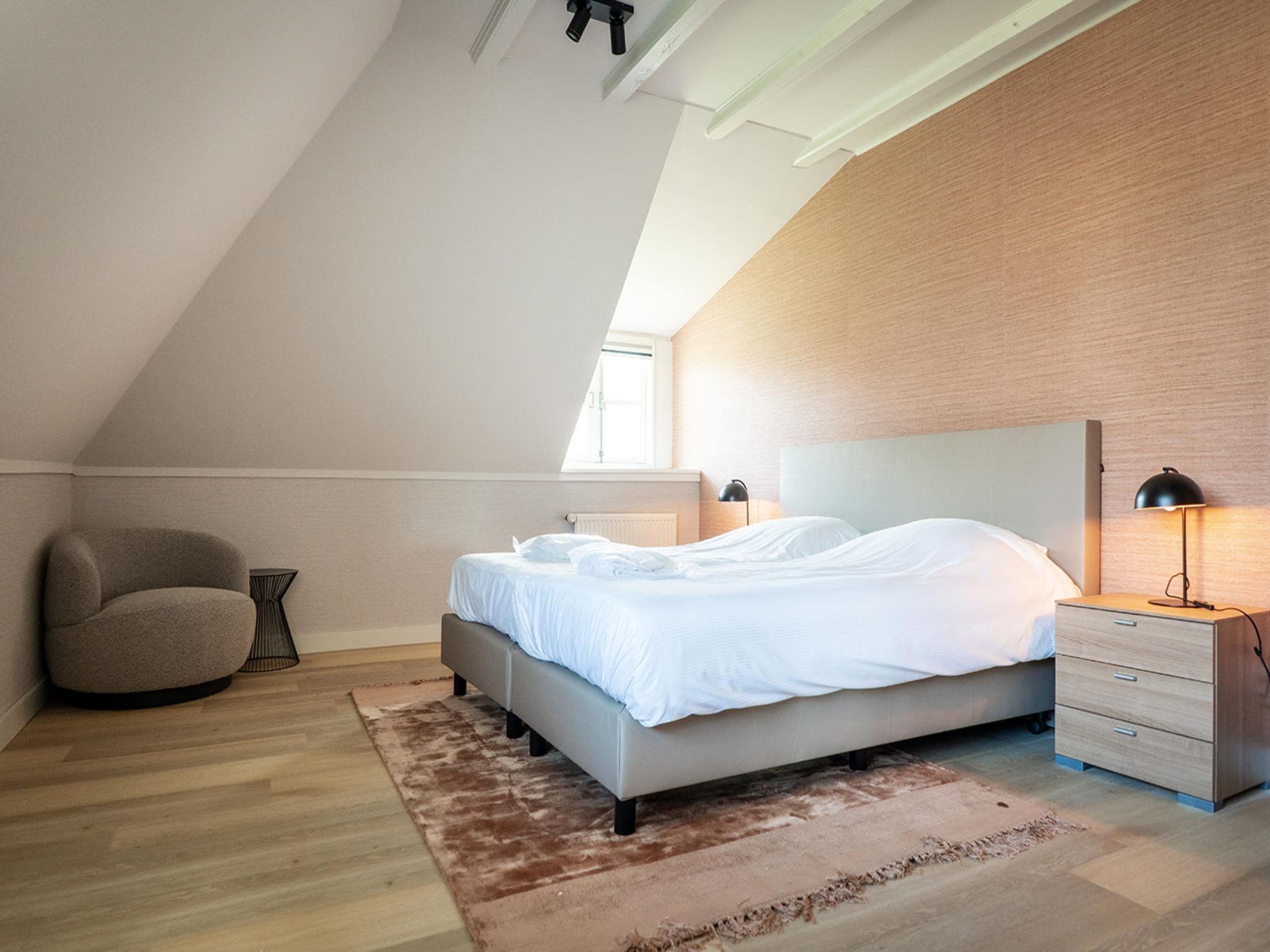 Een slaapkamer van App Hoeve Holland W6 in De Cocksdorp Texel