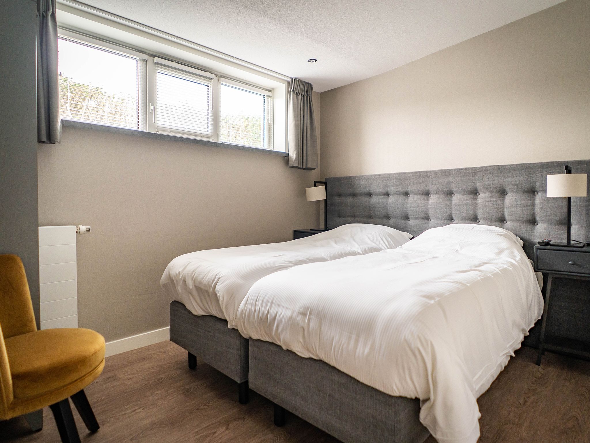 Een slaapkamer van Stoeterij C65 in De Cocksdorp Texel