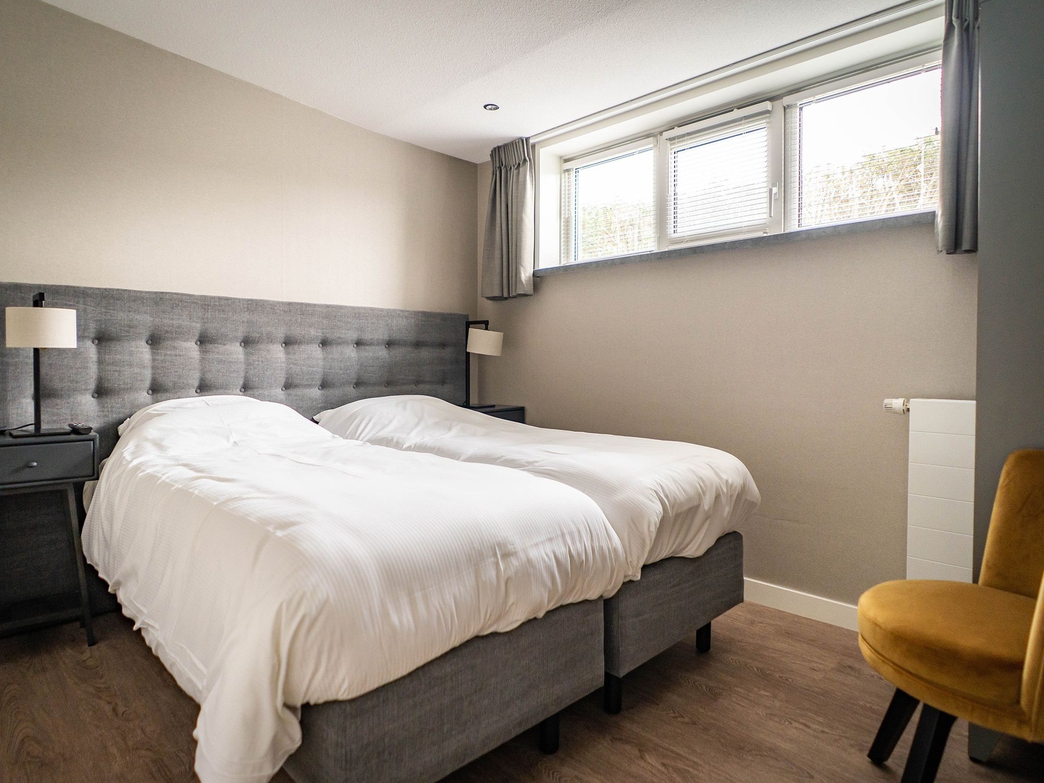 Een slaapkamer van Stoeterij C65 in De Cocksdorp Texel