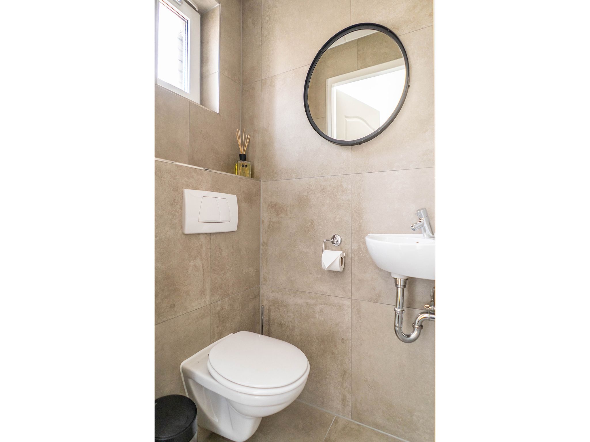 De badkamer van Bungalow van der Linde D-8b in De Cocksdorp Texel