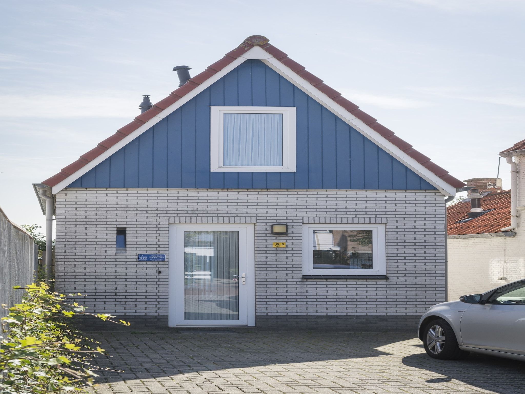 De buitenkant van Bungalow van der Linde D-8b in De Cocksdorp Texel