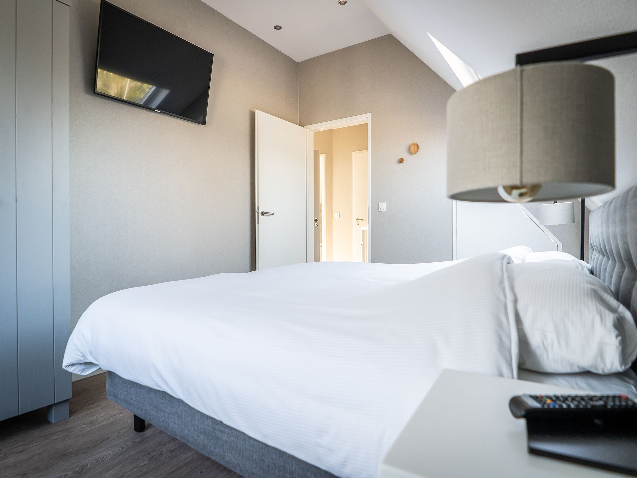 Een slaapkamer van Hodshonstraat B-12 in De Cocksdorp