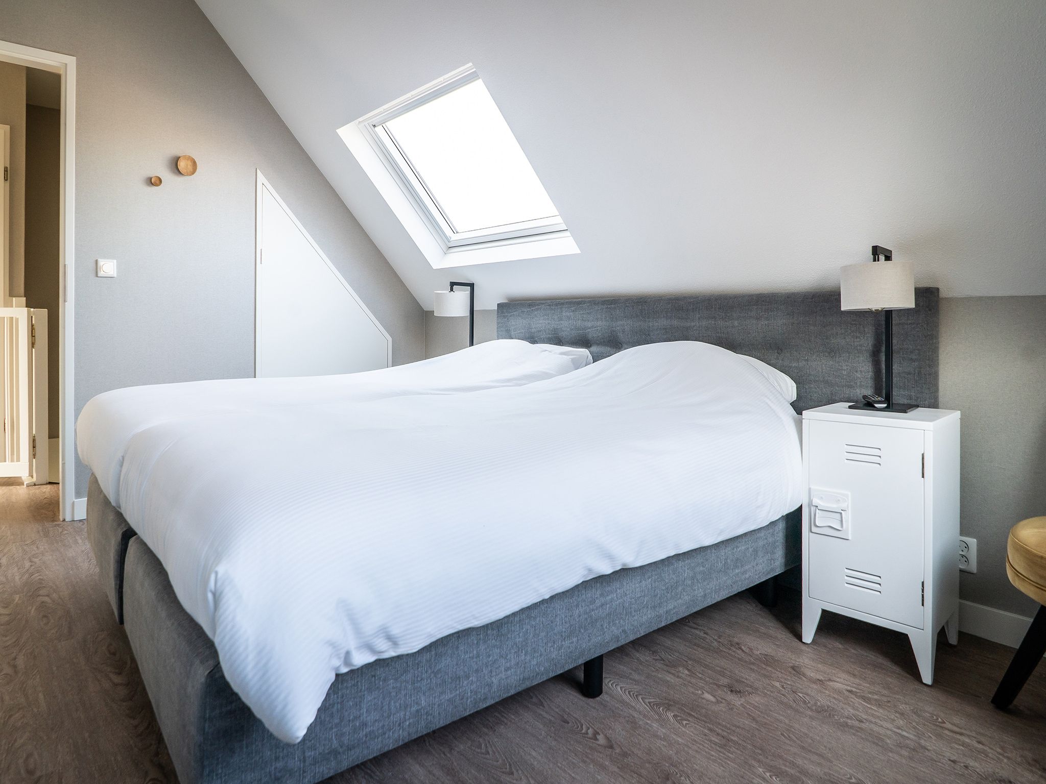 Een slaapkamer van Hodshonstraat B-12 in De Cocksdorp