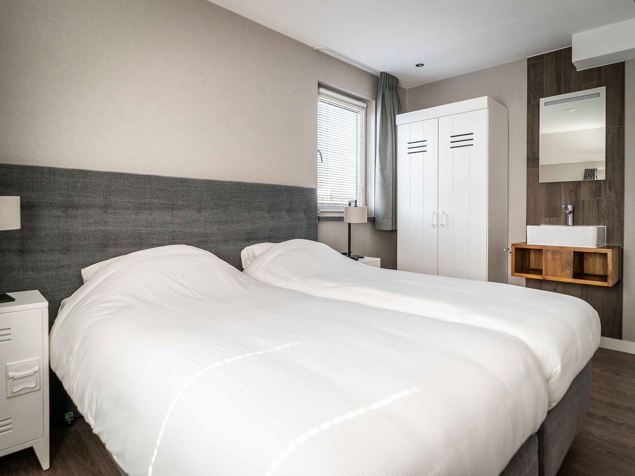 Een slaapkamer van Hodshonstraat B-12 in De Cocksdorp