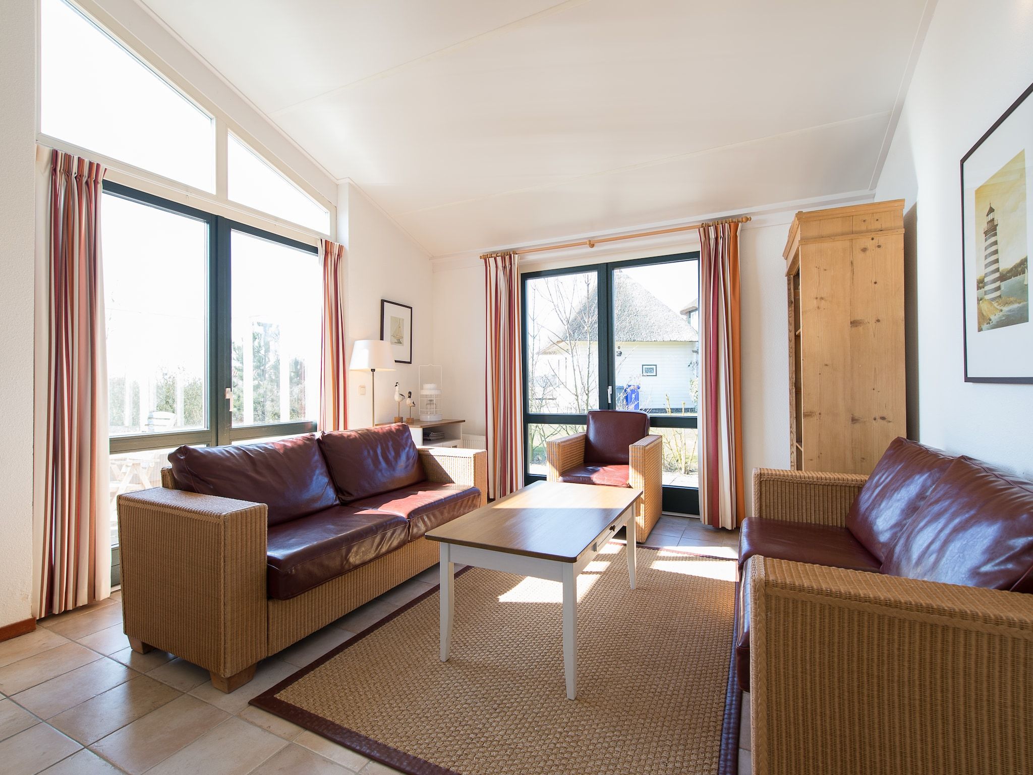 De woonkamer van Vakantiepark Boomhiemke 13 in Hollum