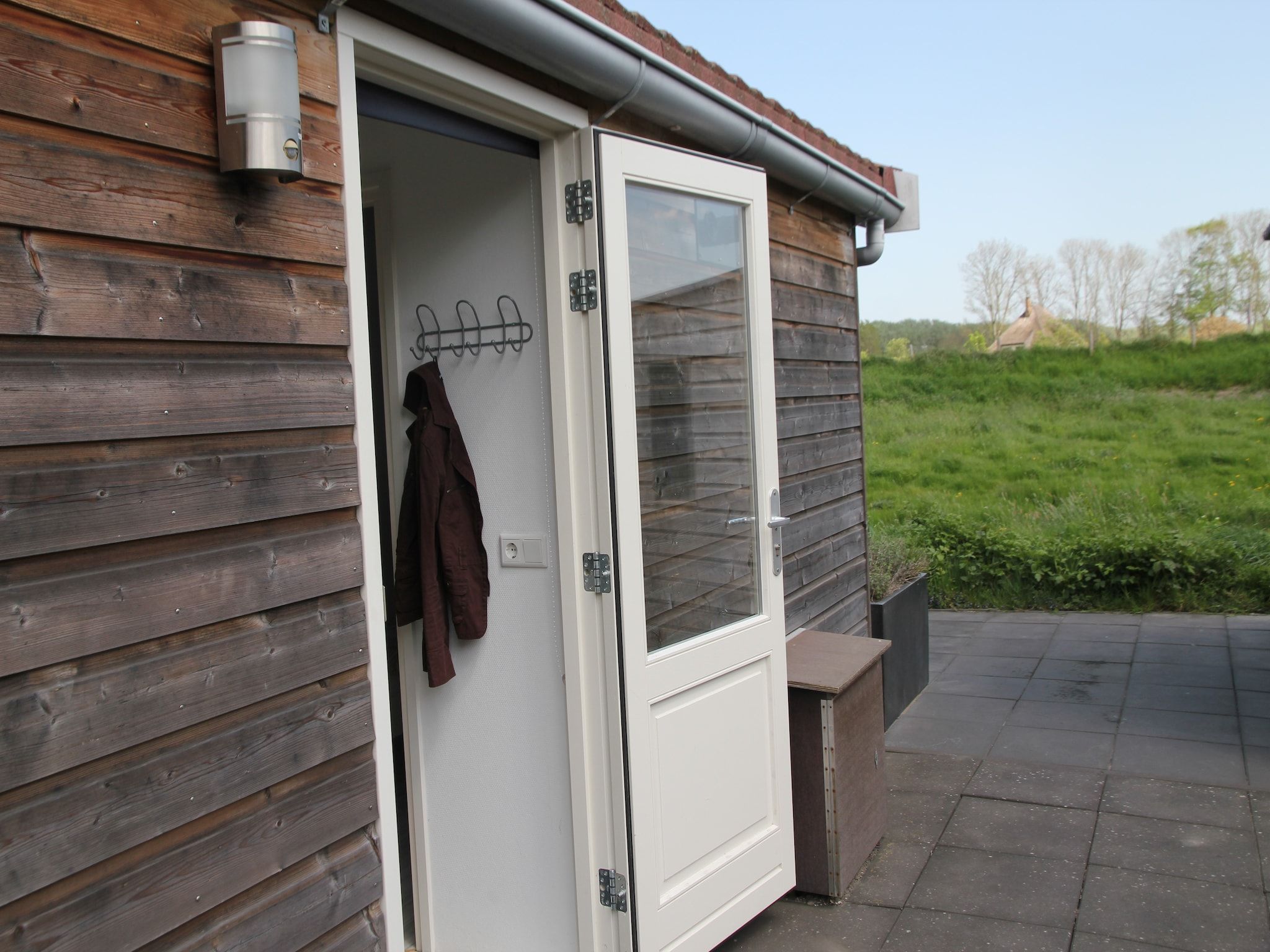 De buitenkant van Landelijk bij Zee in Warmenhuizen