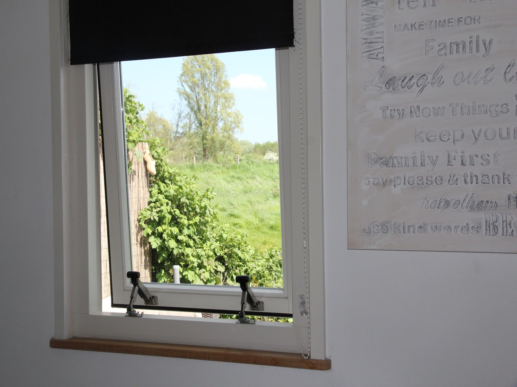 Een slaapkamer van Landelijk bij Zee in Warmenhuizen