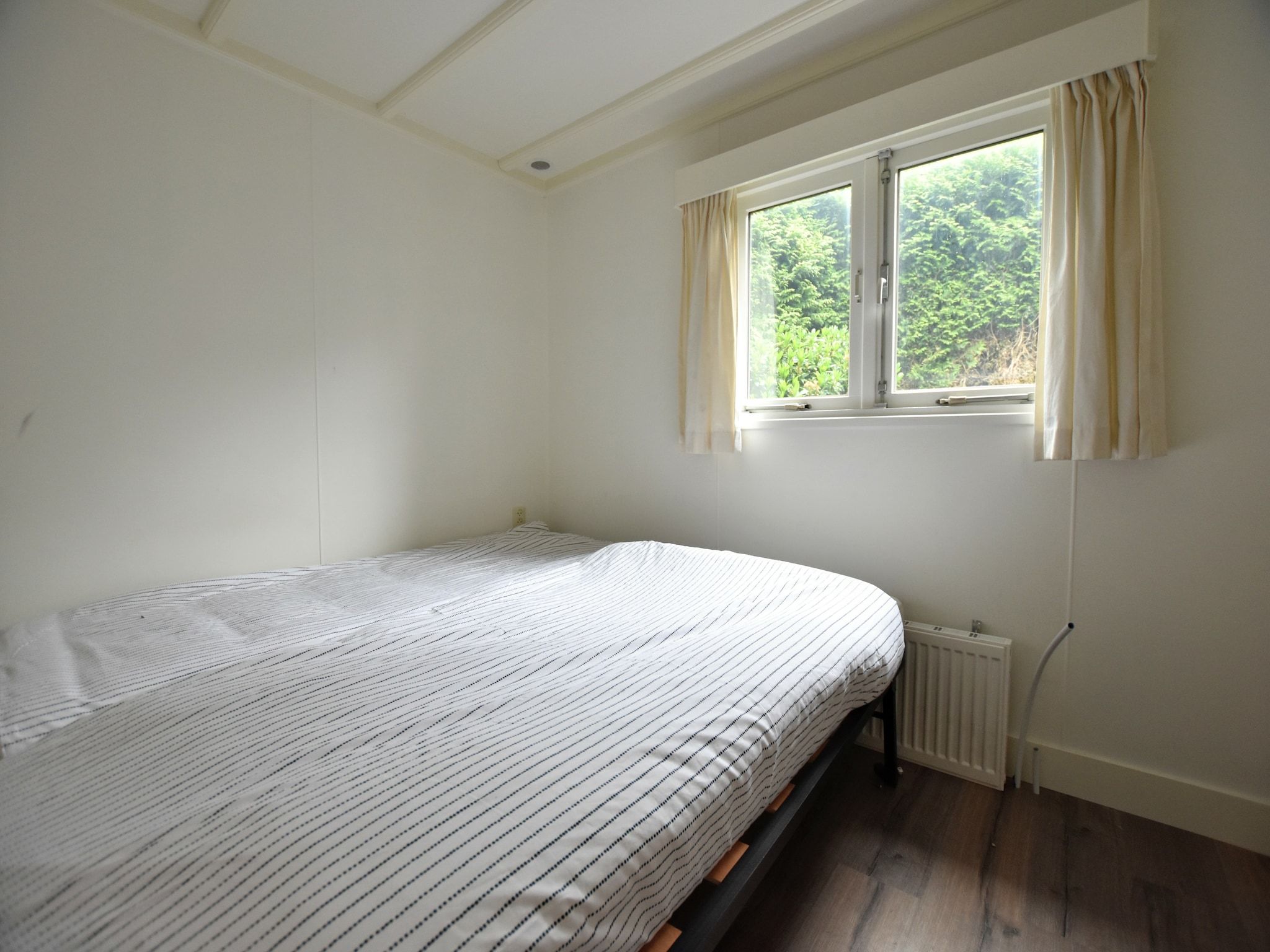 Een slaapkamer van Reewold in Putten