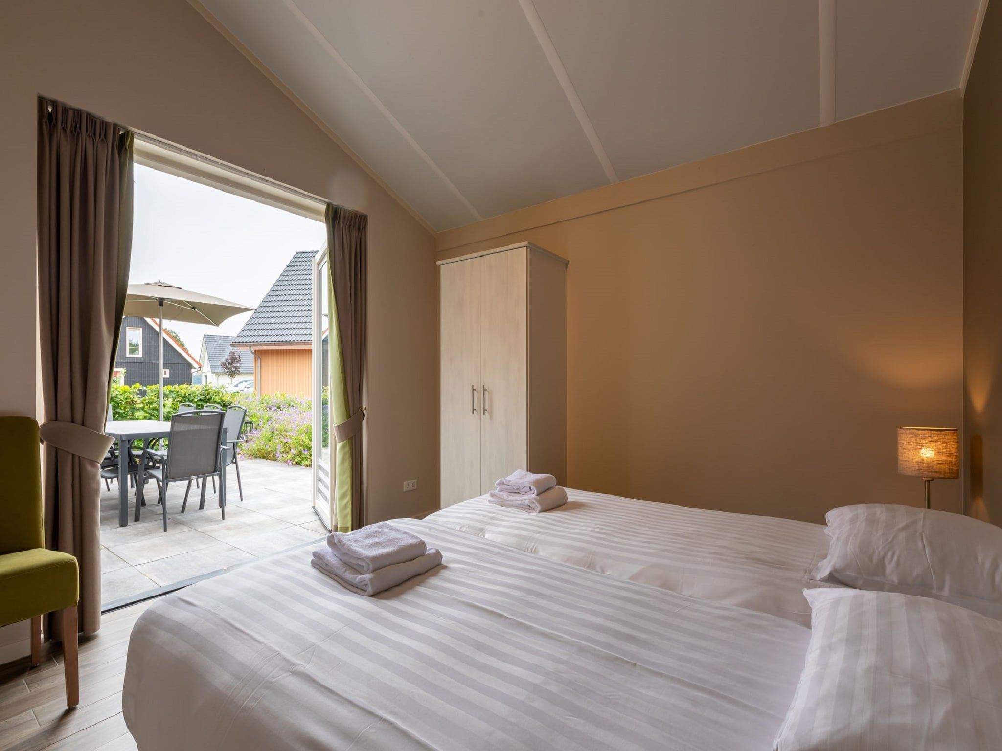 Een slaapkamer van Villapark Ehzerburg 1 in Almen