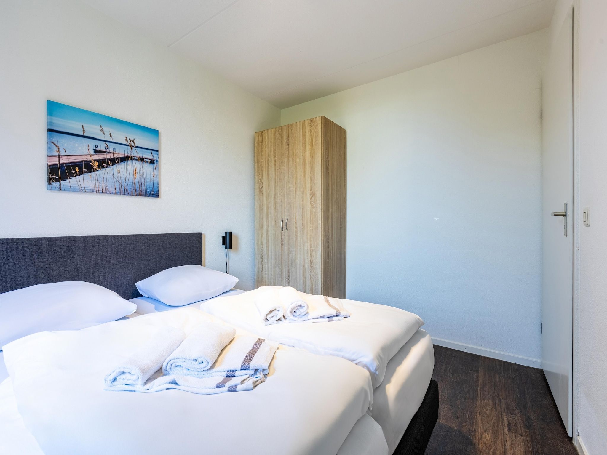 Een slaapkamer van Roompot Beach Resort 21 in Kamperland