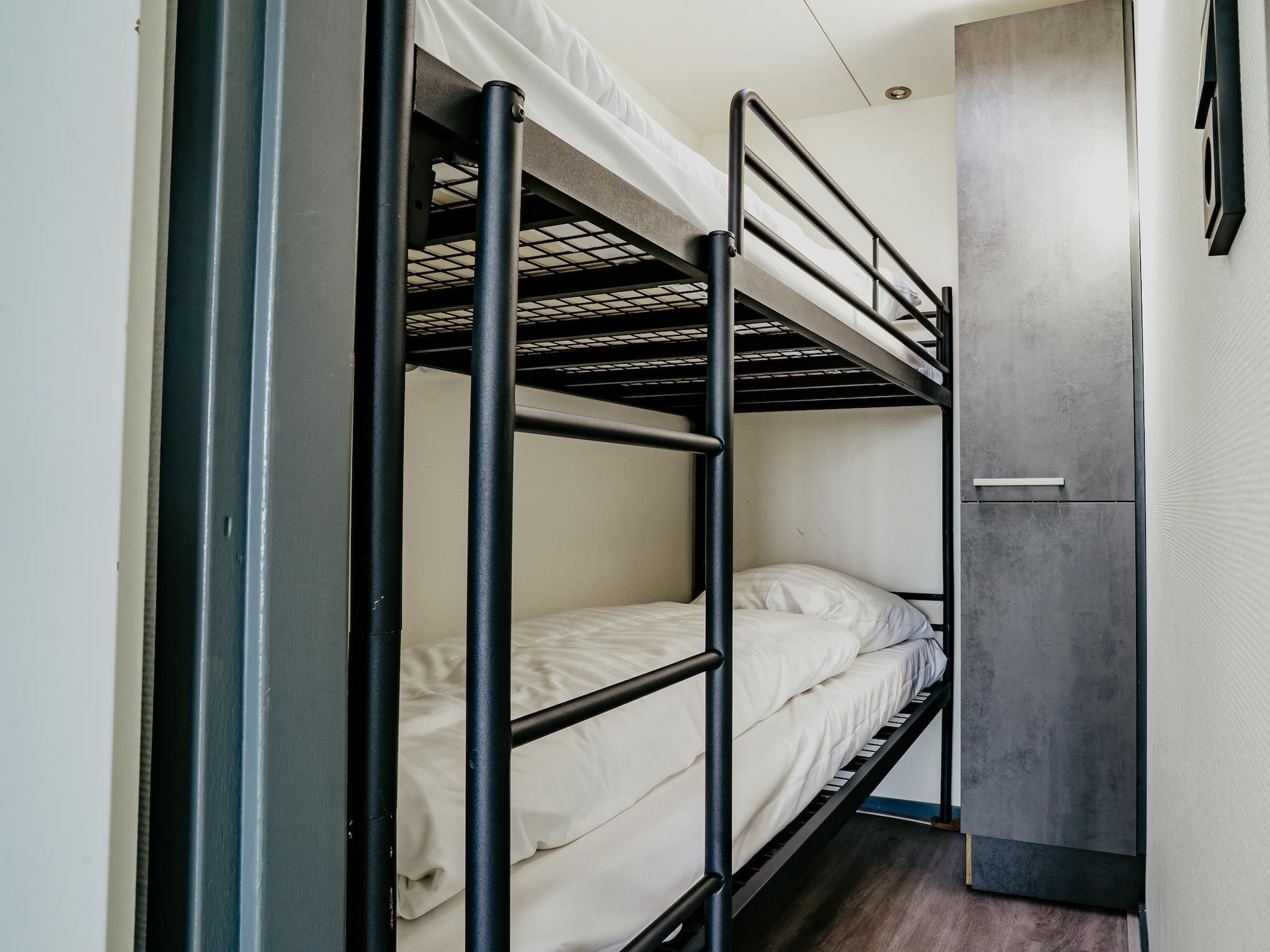 Een slaapkamer van Waterpark de Meerparel 9 in Uitgeest