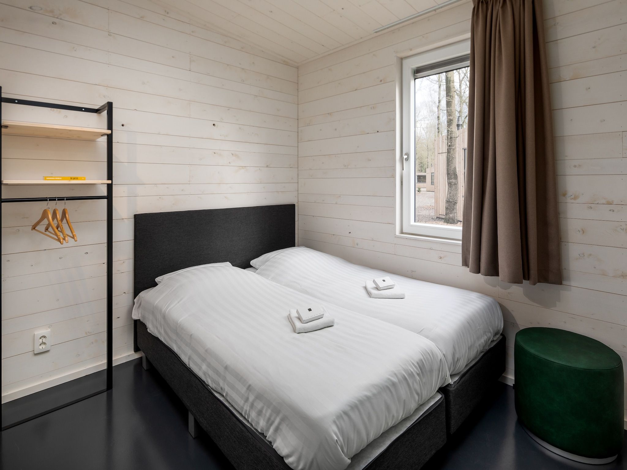 Een slaapkamer van Vakantiepark Schaijk 3 in Schaijk