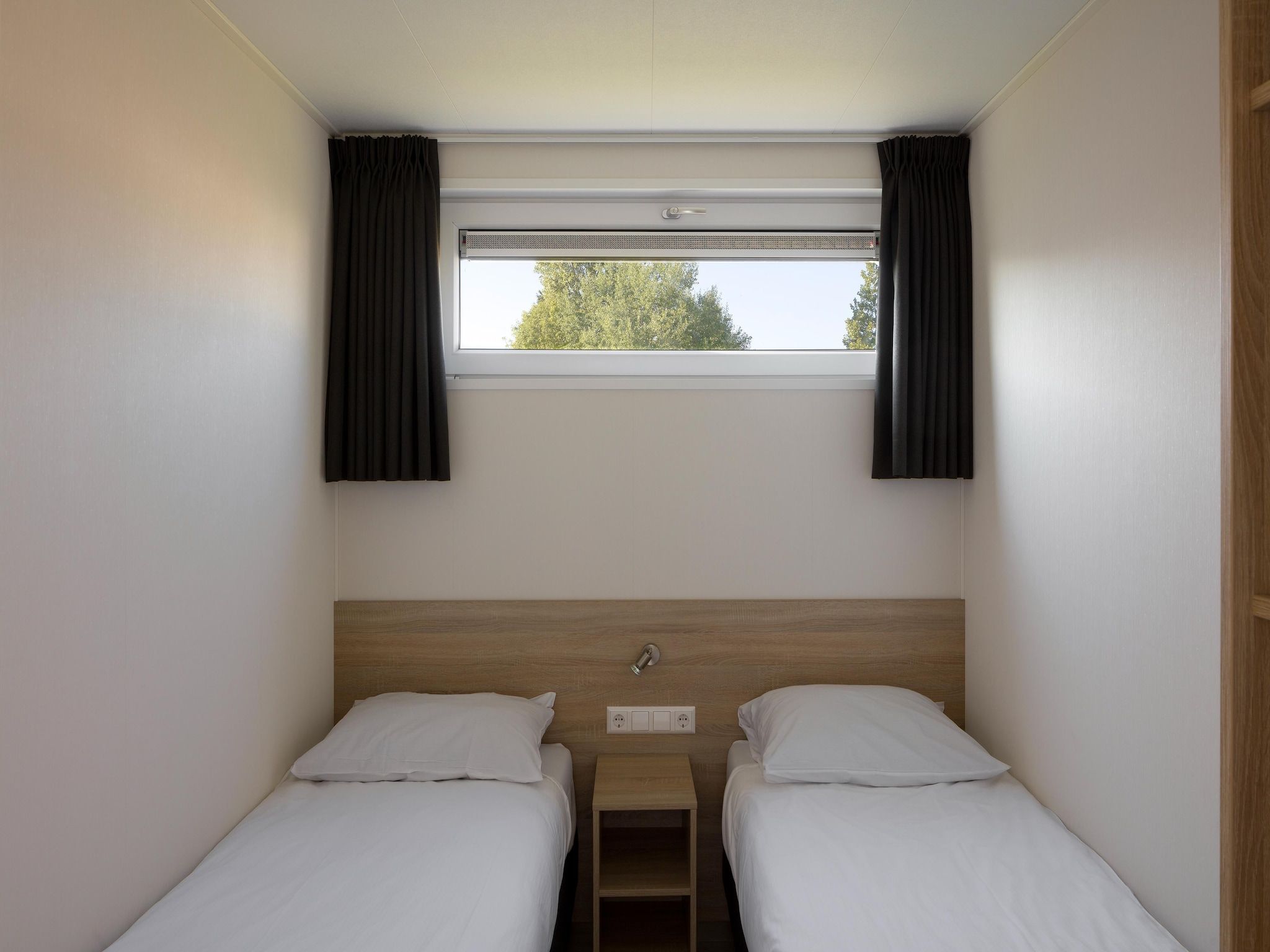 Een slaapkamer van Beach Resort Nieuwvliet-Bad 5 in Nieuwvliet-Bad