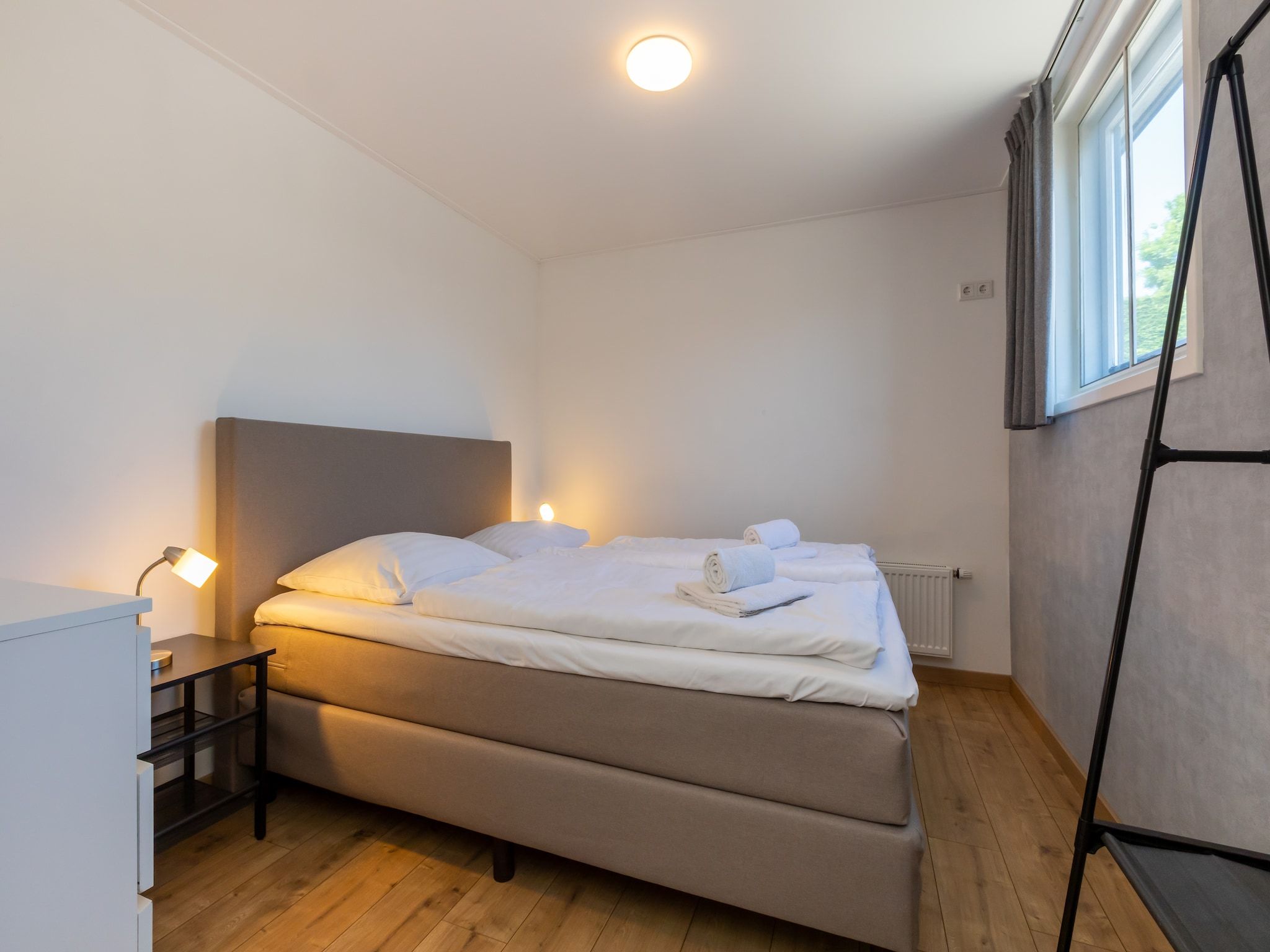 Een slaapkamer van Inlaag 20 in Wolphaartsdijk