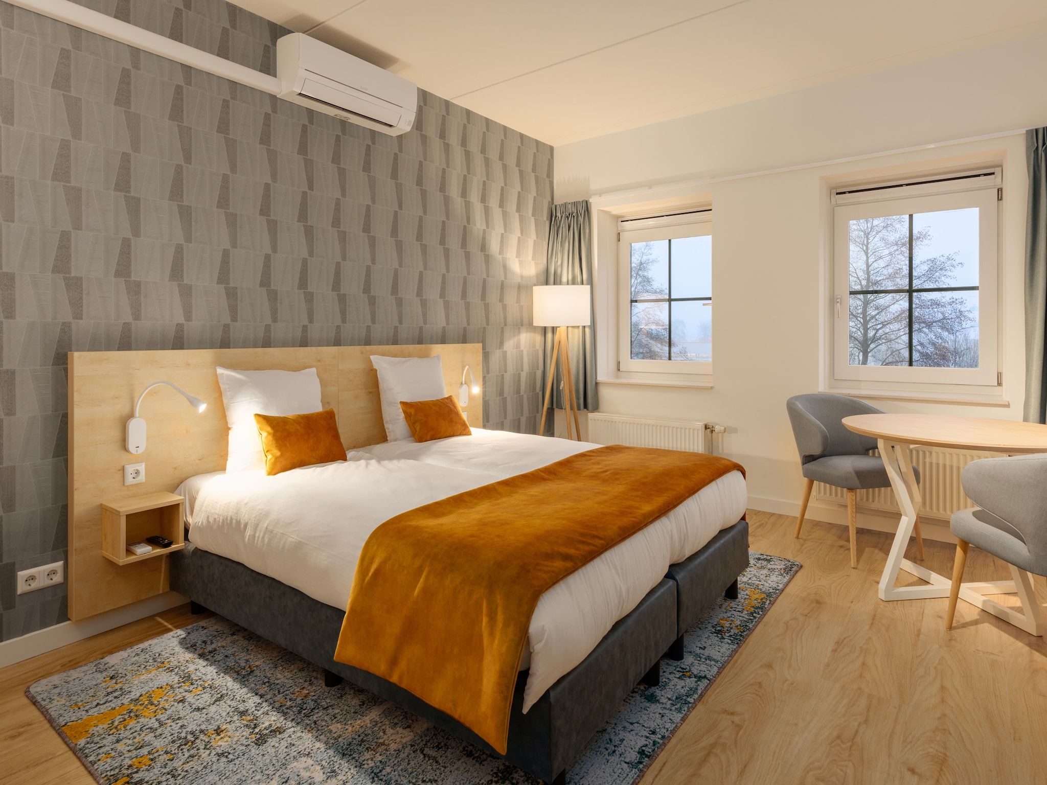 Een slaapkamer van Marinapark Volendam 9 in Volendam