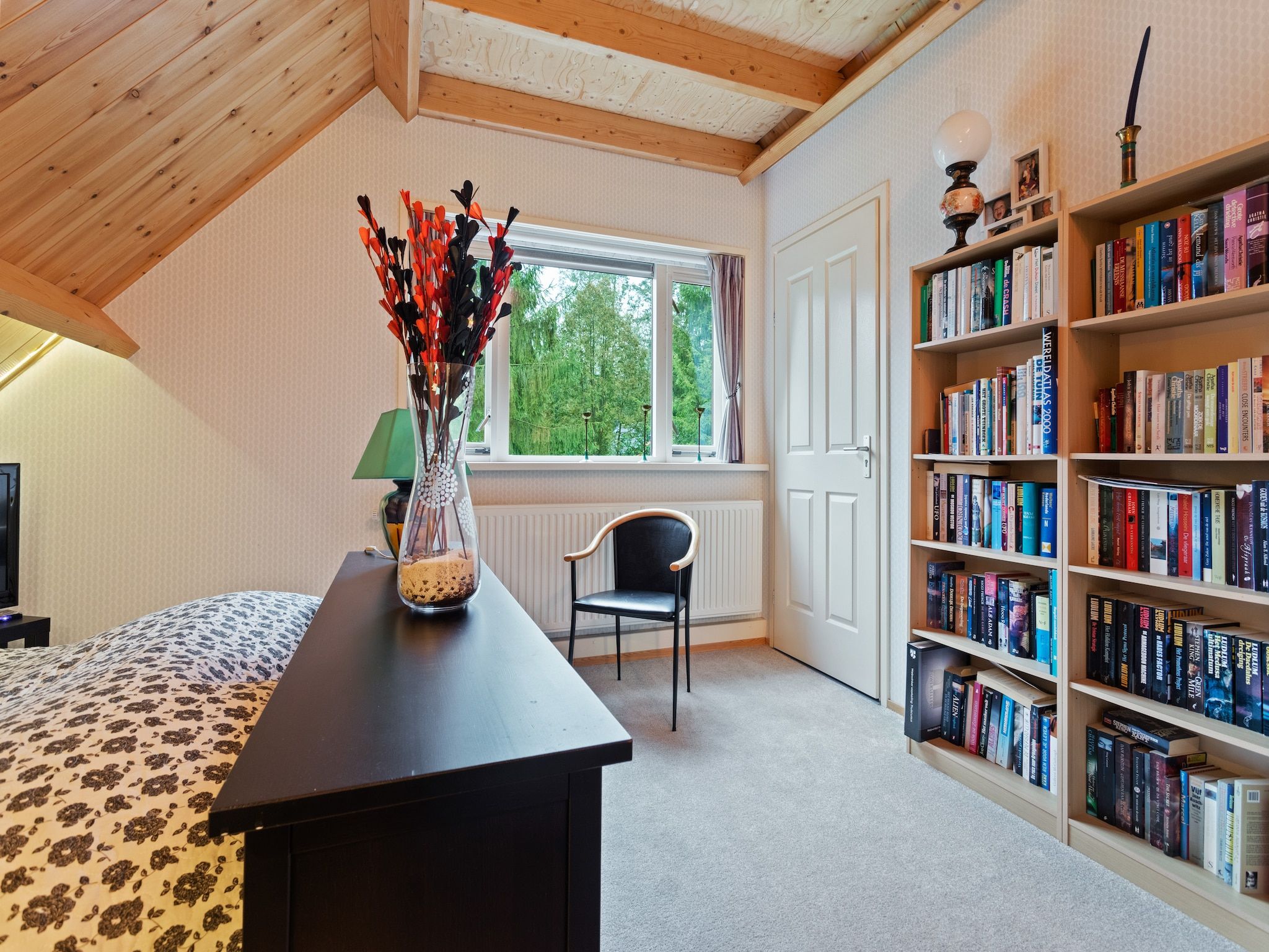 Een slaapkamer van Prachtig vrijstaand huis met tuin op de Veluwe in Epe