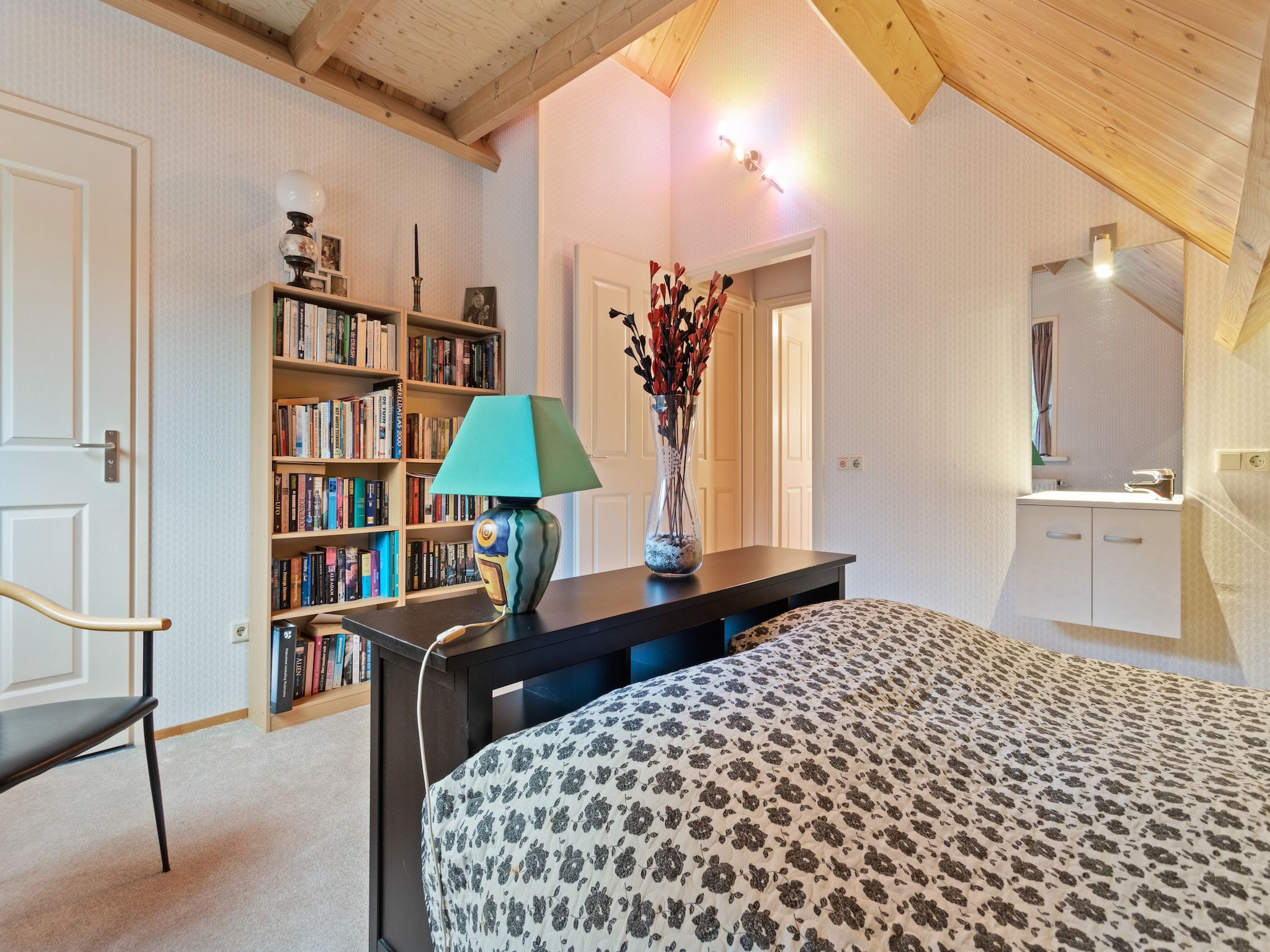 Een slaapkamer van Prachtig vrijstaand huis met tuin op de Veluwe in Epe