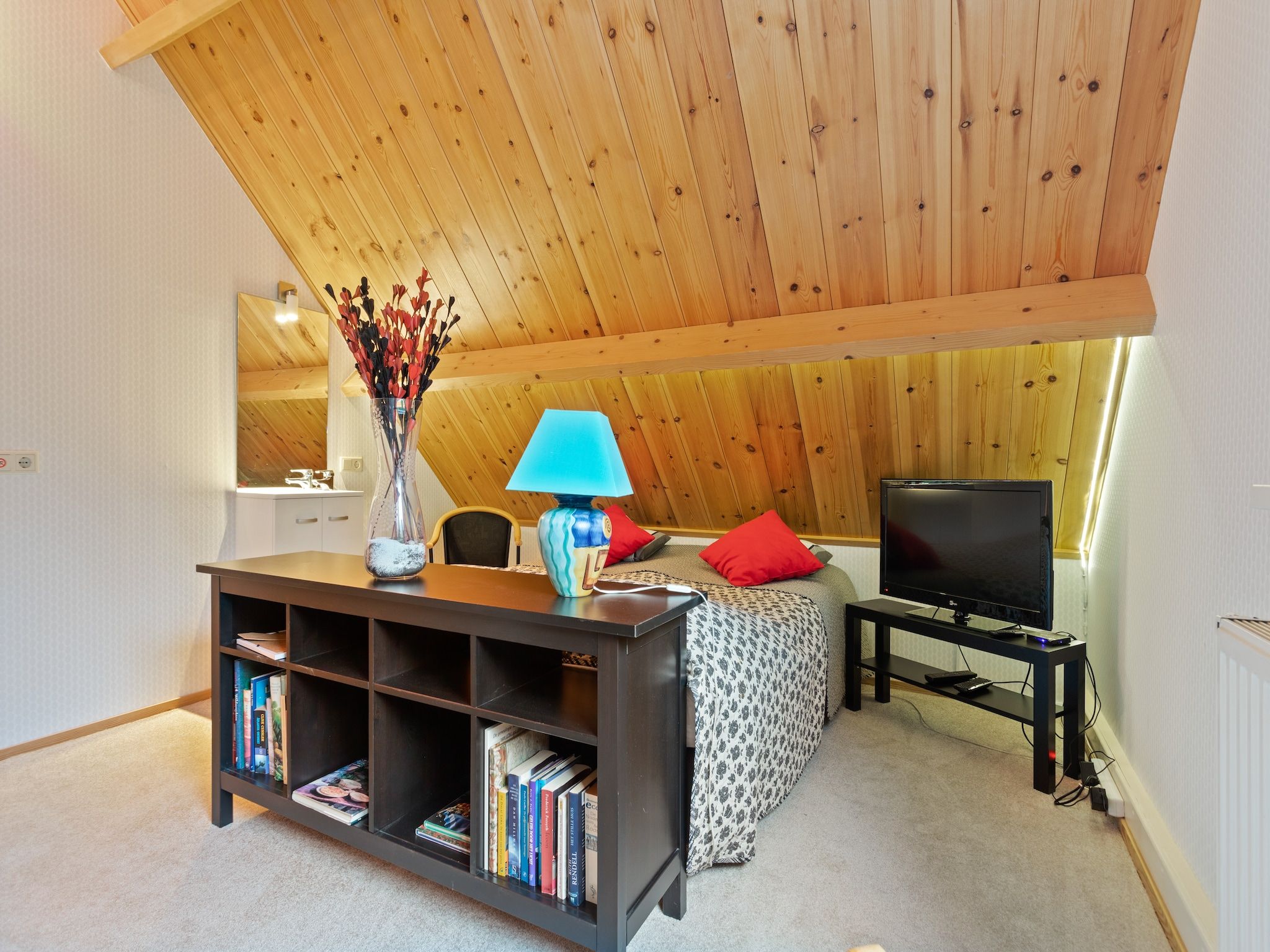 Een slaapkamer van Prachtig vrijstaand huis met tuin op de Veluwe in Epe