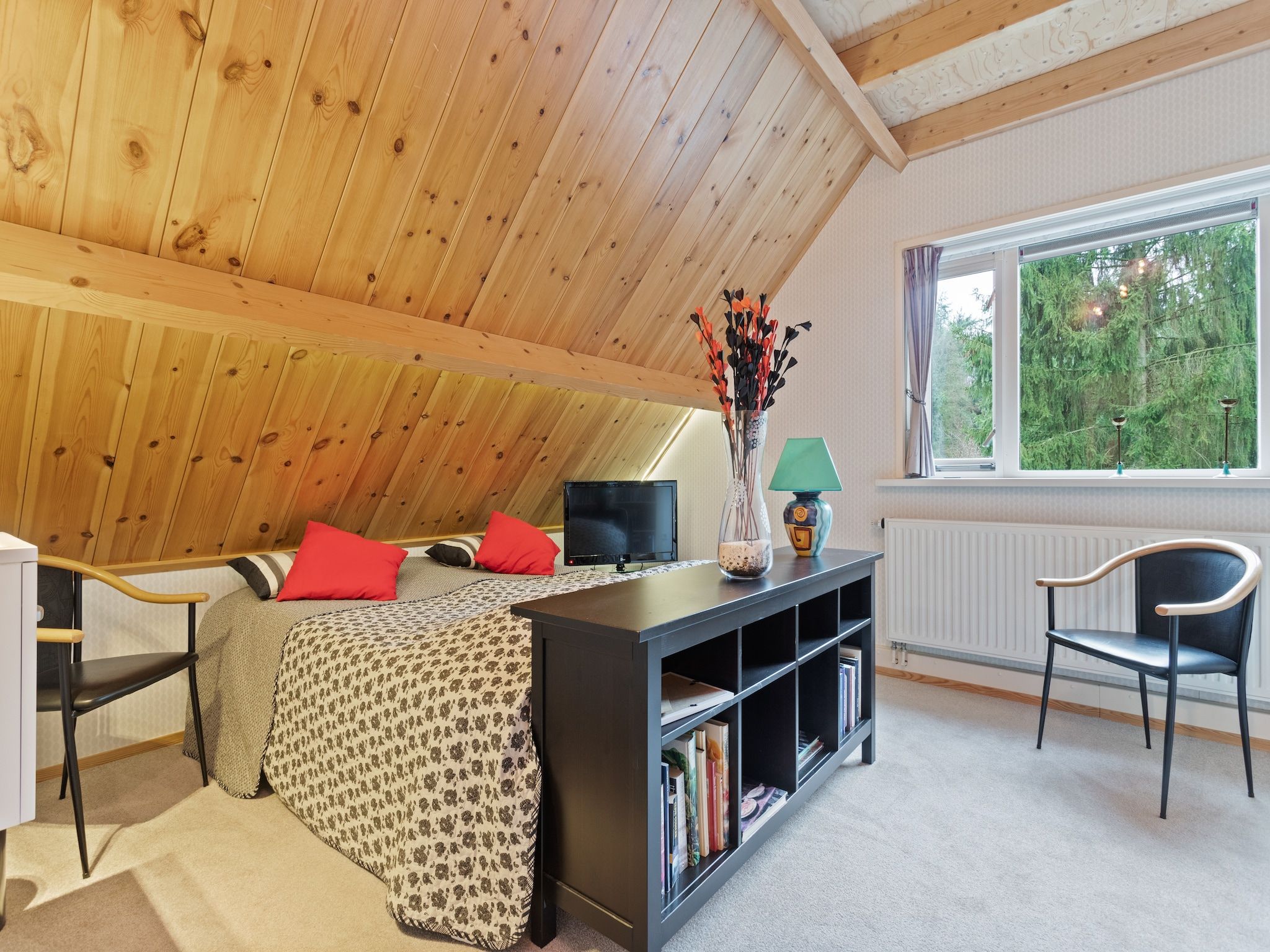 Een slaapkamer van Prachtig vrijstaand huis met tuin op de Veluwe in Epe