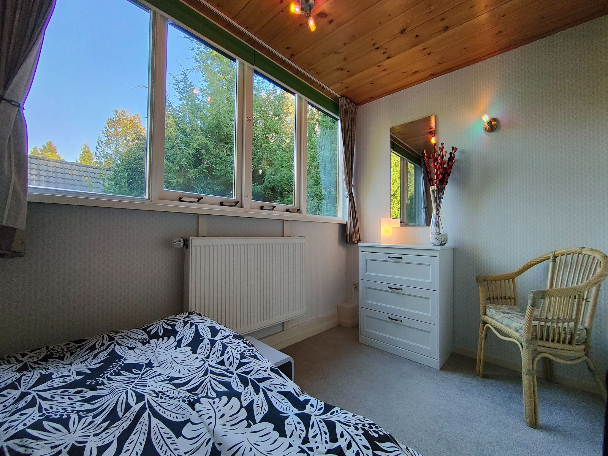 Een slaapkamer van Prachtig vrijstaand huis met tuin op de Veluwe in Epe