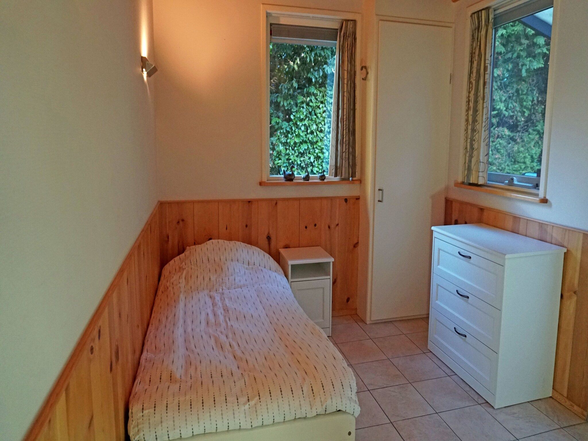 Een slaapkamer van Prachtig vrijstaand huis met tuin op de Veluwe in Epe