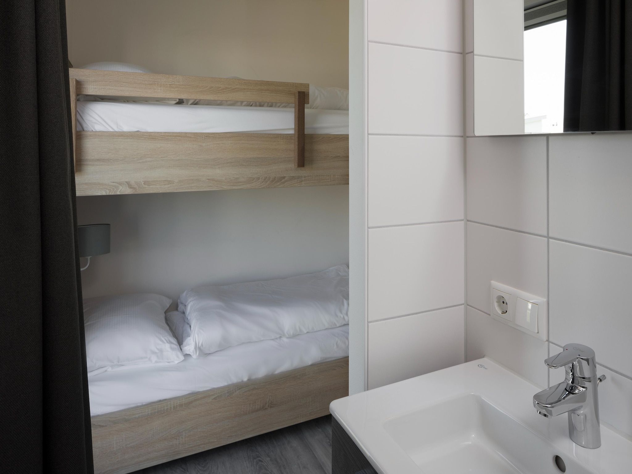 Een slaapkamer van Beach Resort Nieuwvliet-Bad 11 in Nieuwvliet